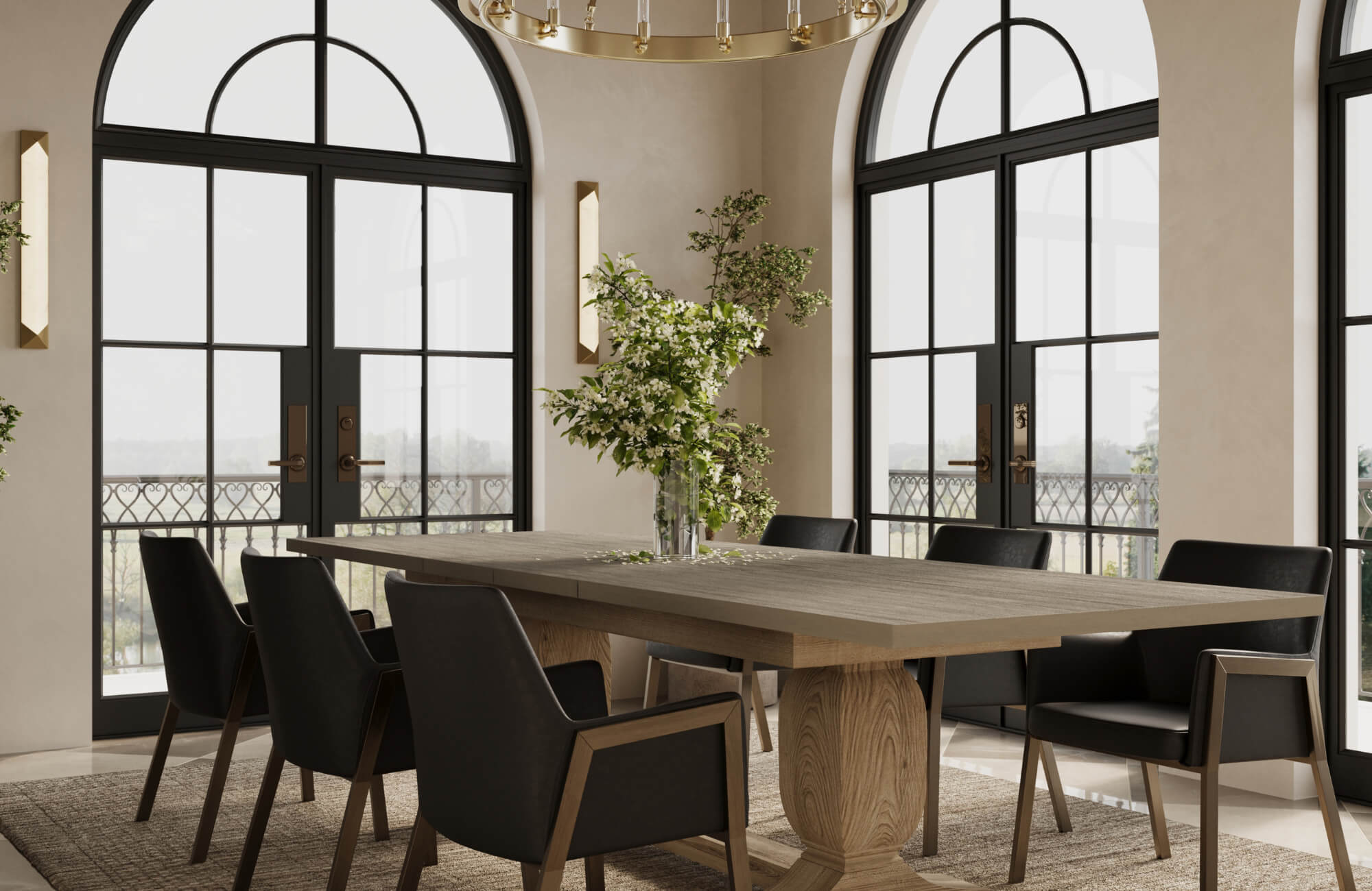 Black dining chairs around a long light wood table, framed by arched windows and natural light that prevents the seating from feeling heavy.