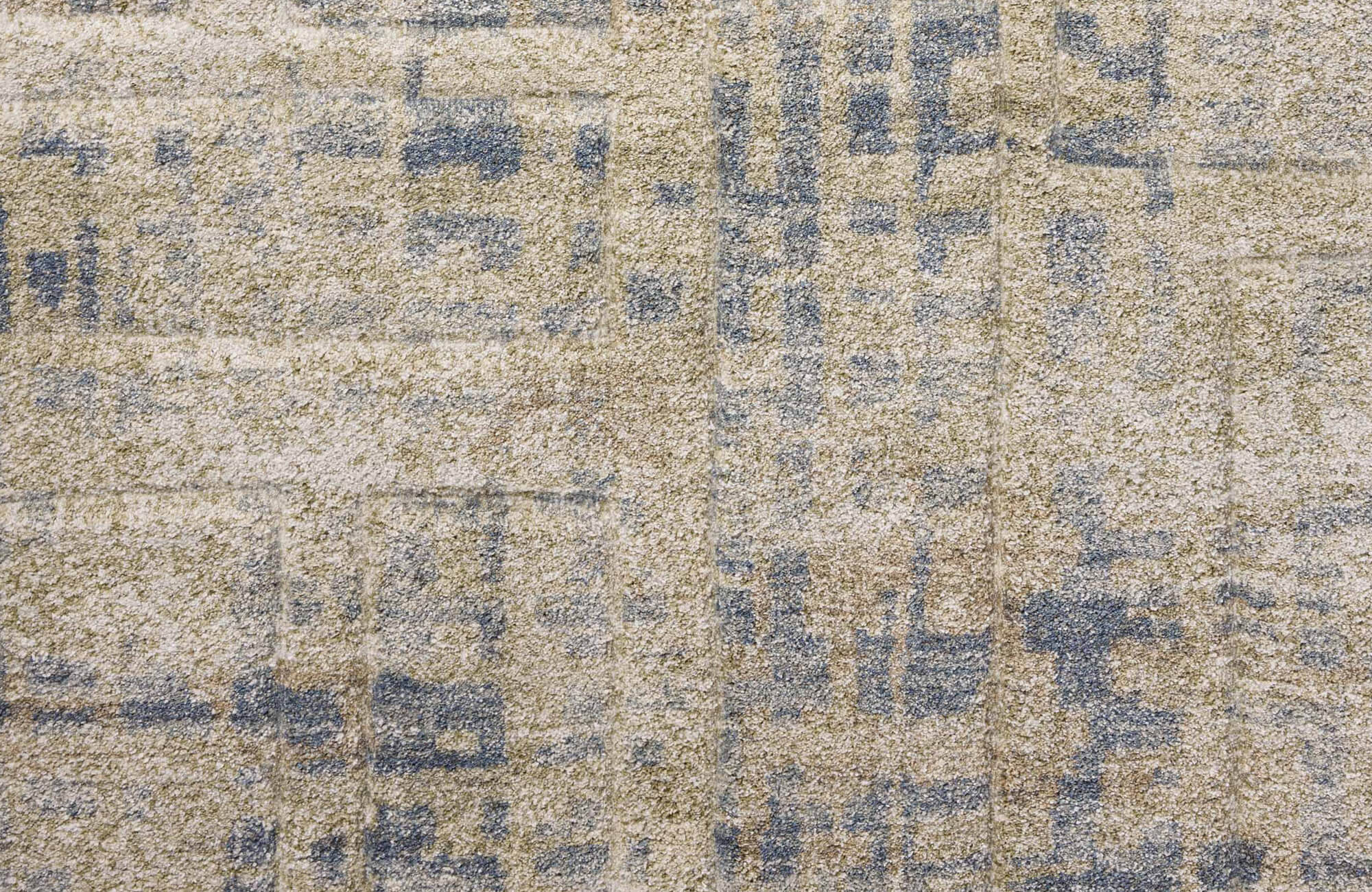 null Layered polypropylene rug in soft cream and blue stripes, showcasing plush texture atop a wood floor.