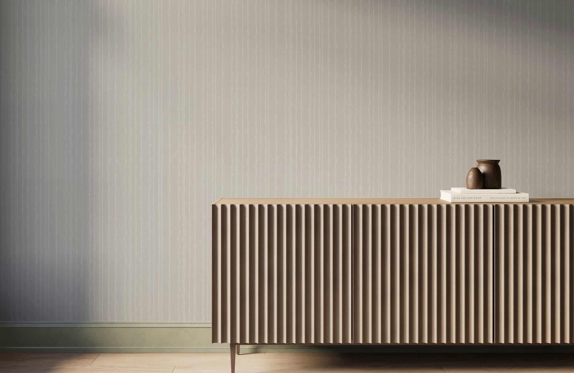 null Modern minimalist interior with subtle vertical striped wallpaper, a fluted taupe sideboard, light wood flooring, and neutral decorative accents in a soft contemporary palette.