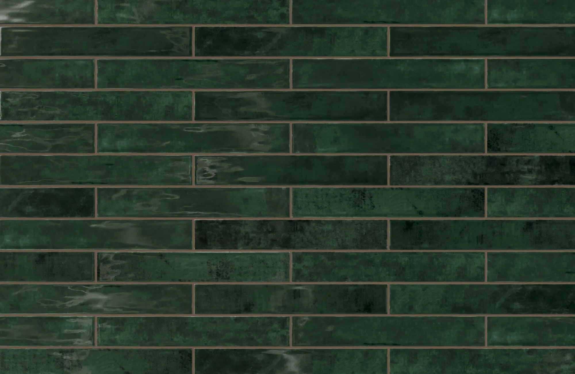 Jaden 2.5x16 glossy ceramic tile in Hunter green boasts a rich, vibrant finish, ideal for adding depth and sophistication to any space.