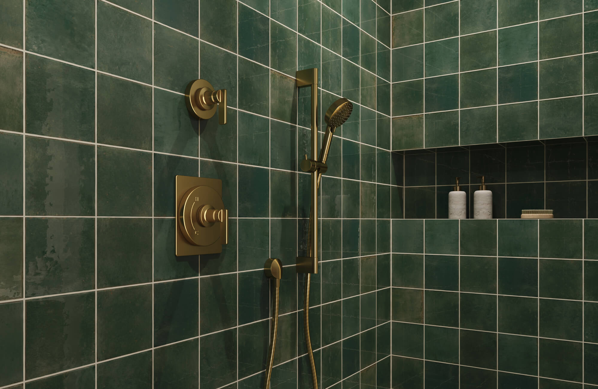 null Dark green square shower tiles with pale grout lines, brass shower fixtures, and a recessed niche that emphasizes the clean grid layout.