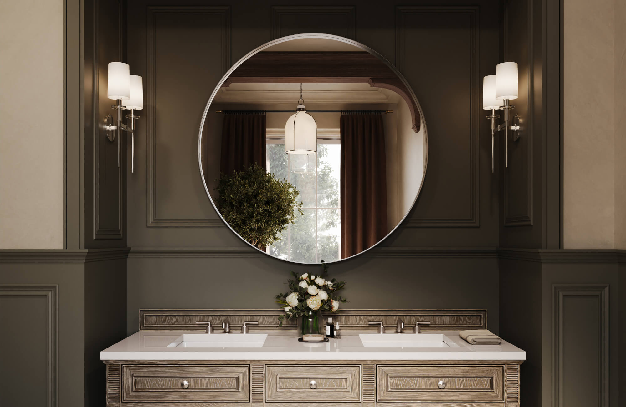 null Elegant double vanity with a large round mirror, bronze wall sconces, and taupe paneled walls.