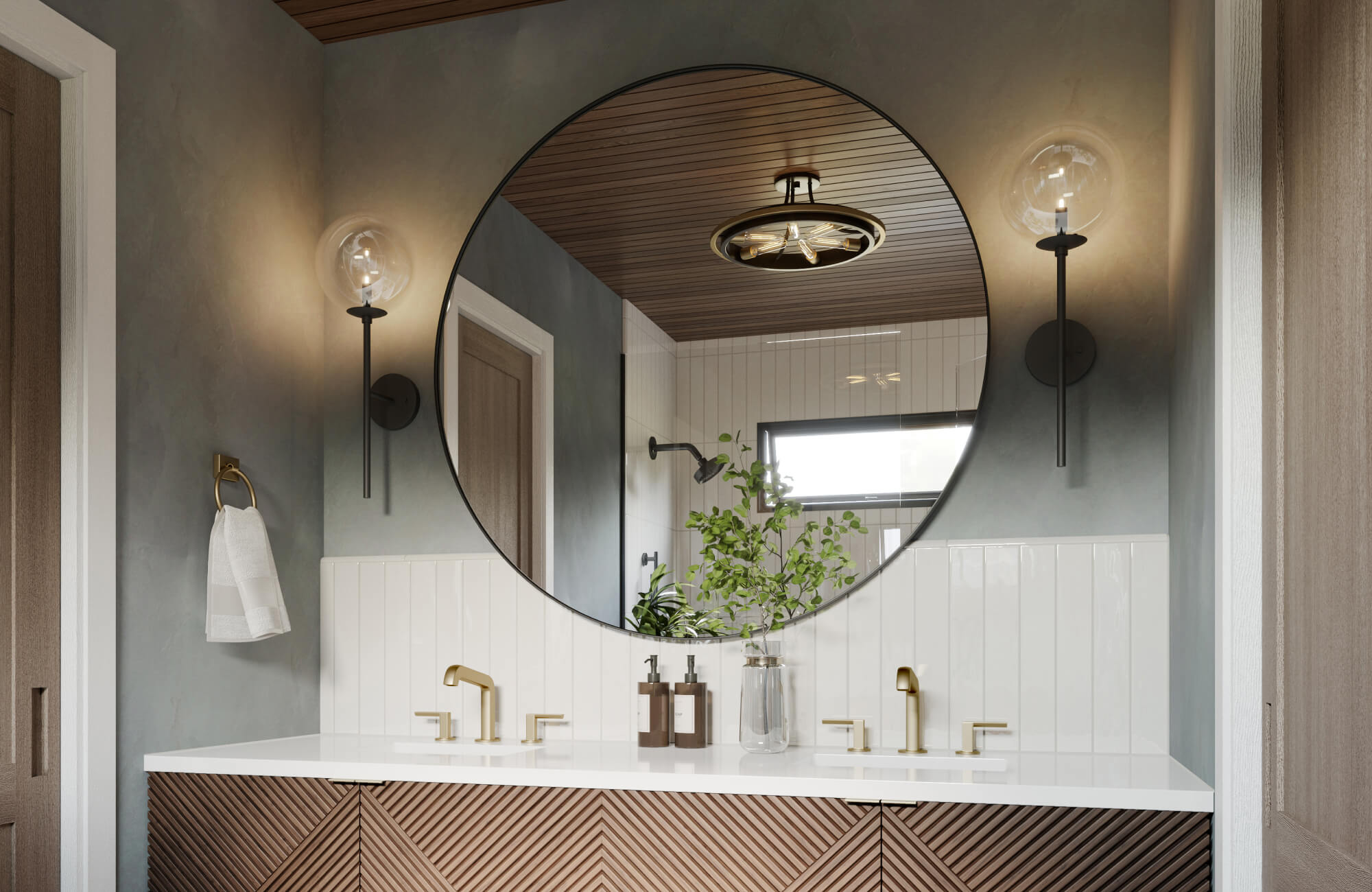 null Contemporary vanity with chevron wood cabinetry, brass faucets, and a round mirror reflecting a tiled shower.