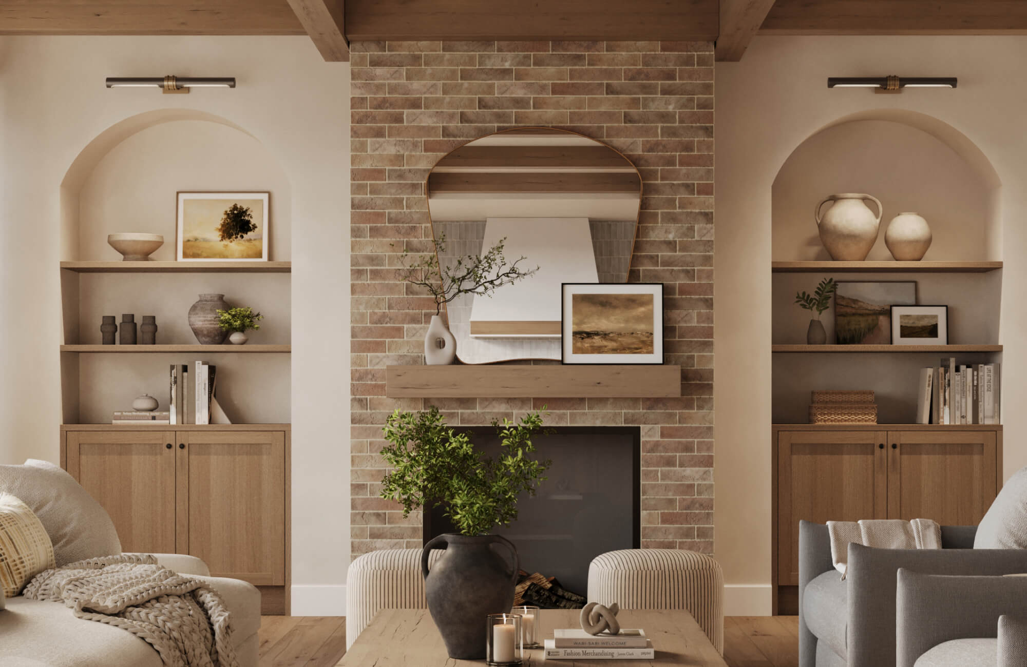 Warm, inviting living room with a brick fireplace, arched alcoves, picture lights, and earthy-toned decor and artwork throughout.