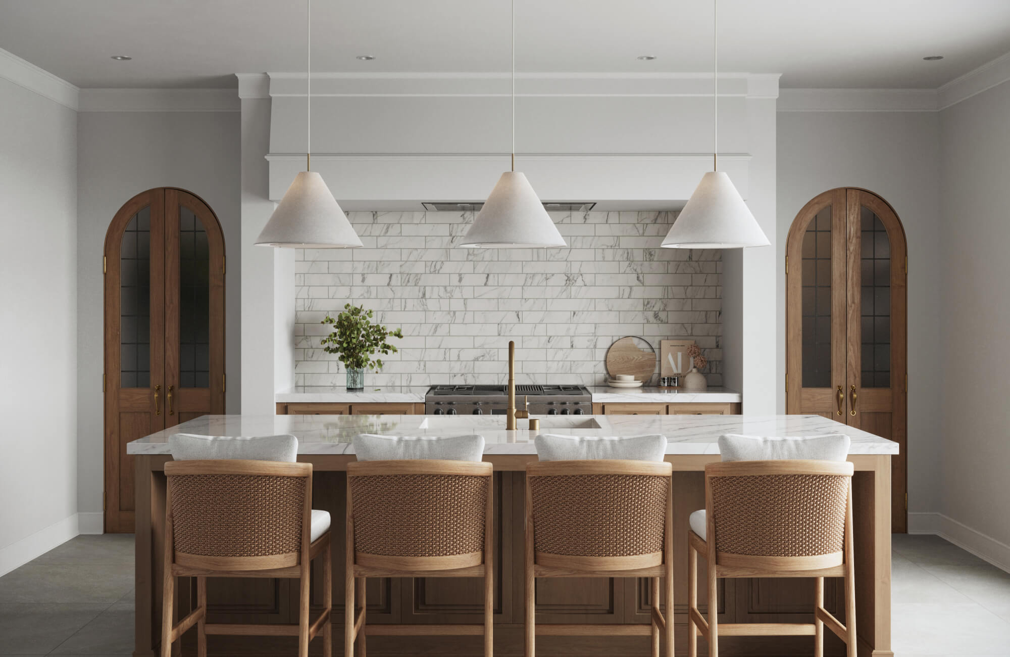 null Wide kitchen island featuring balanced pendant light placement over a white marble surface, styled with natural wood seating, arched wood doors, and a clean tiled wall behind the range.
