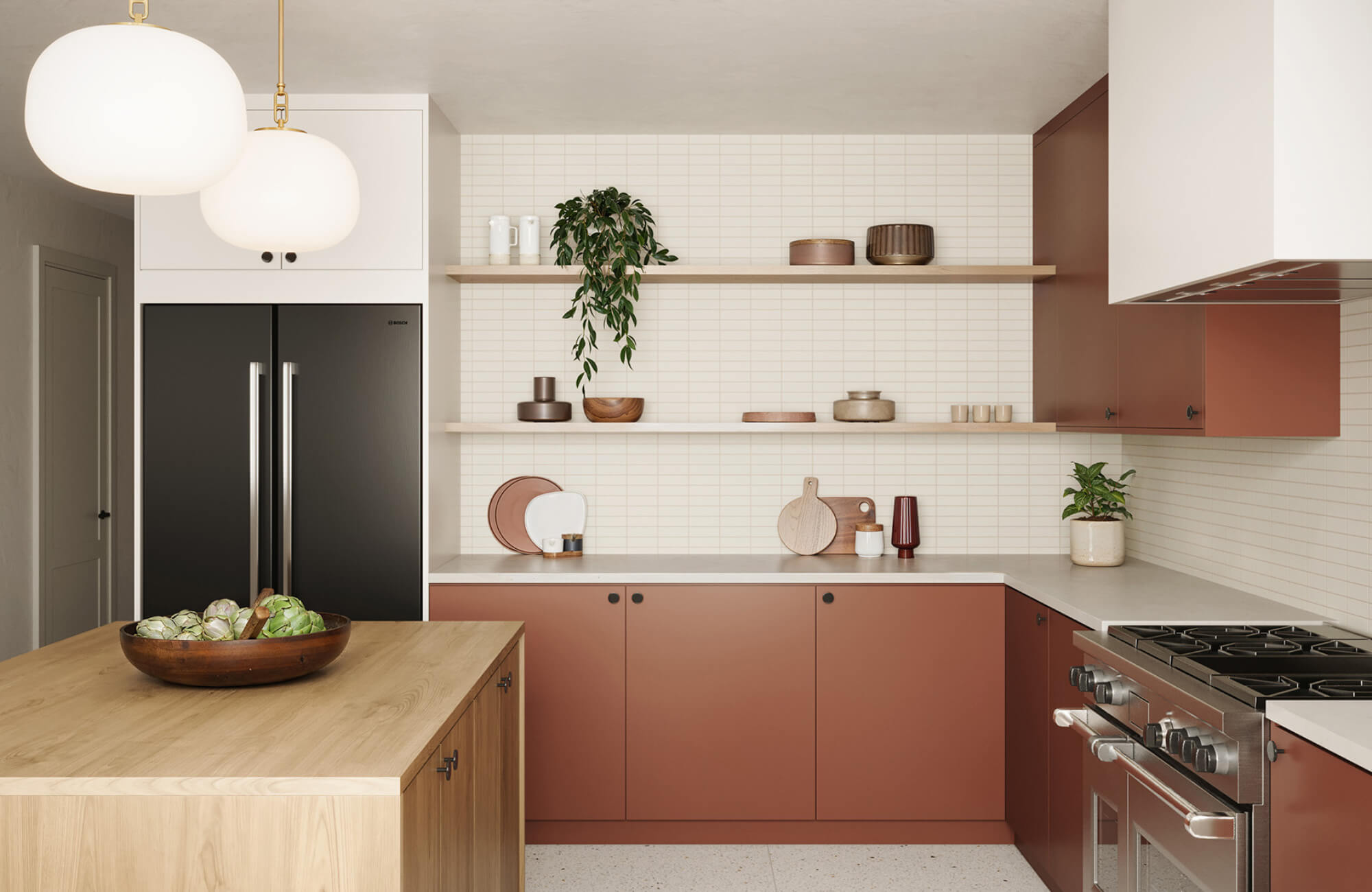 null Modern kitchen with terracotta cabinets, light wood island, and two globe pendant lights hanging above a minimalist workspace.