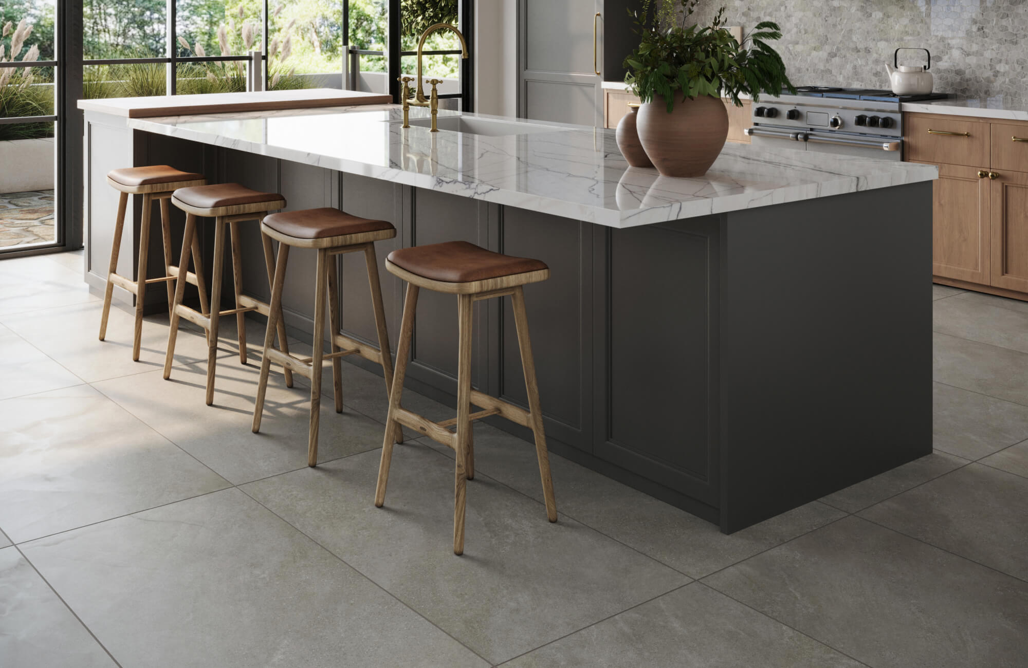 null Light cement look porcelain floor tiles bring modern elegance and subtle texture to this bright, nature-connected kitchen.