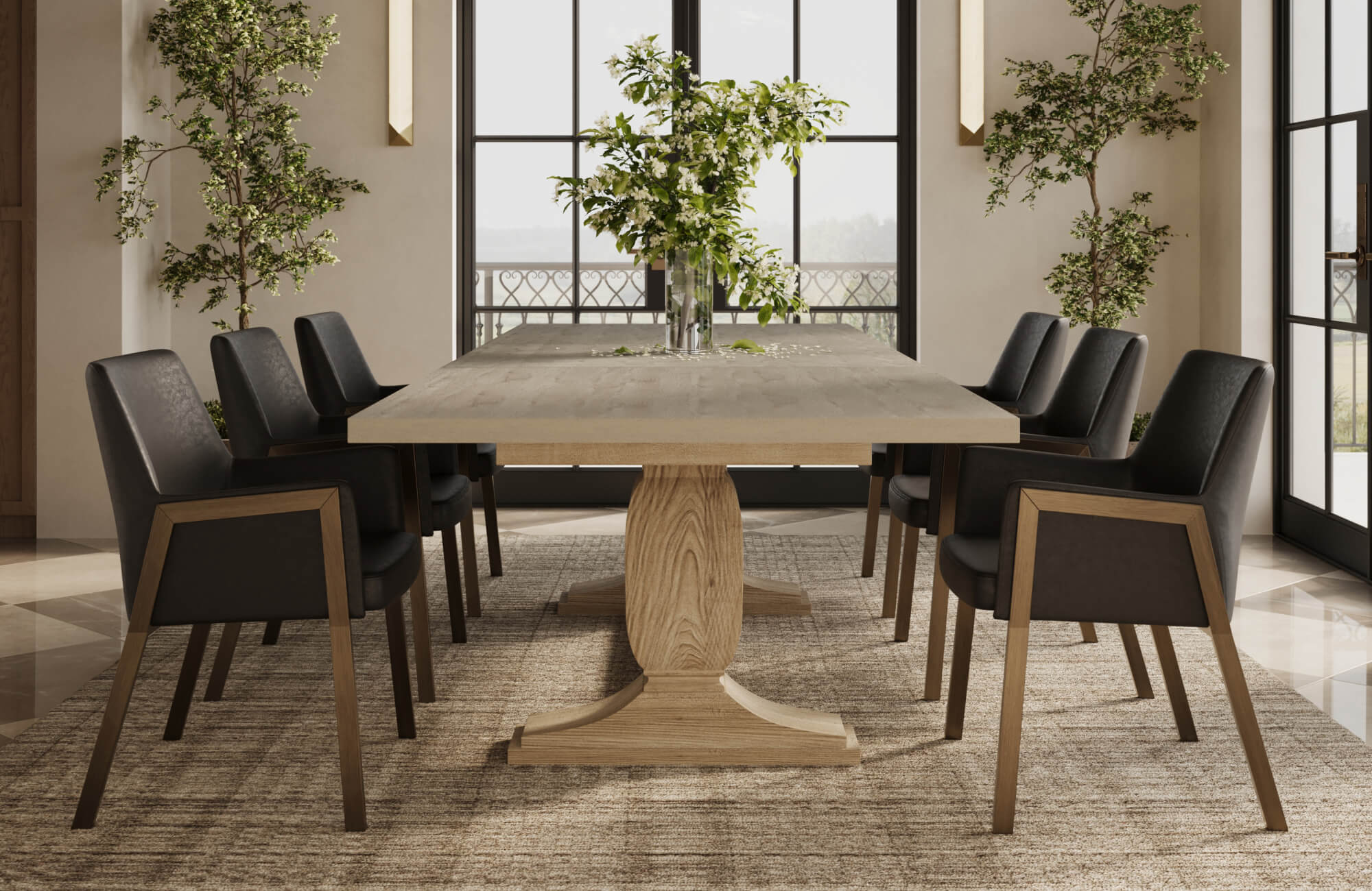 Elegant dining room table set featuring a light wood pedestal table paired with sleek black upholstered chairs, positioned on a textured area rug and framed by tall windows and lush greenery for a refined, airy ambiance.