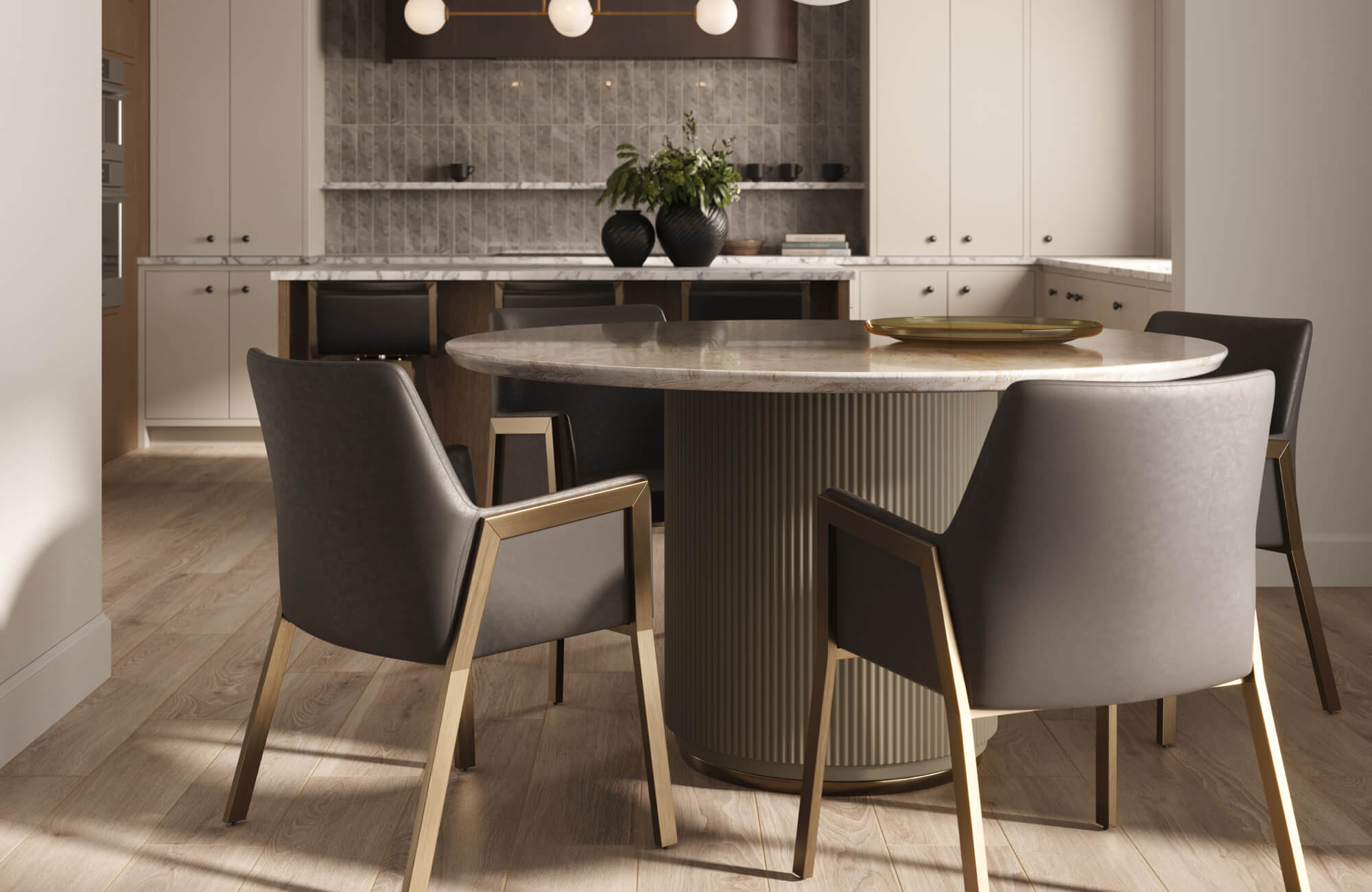 Sophisticated dining space highlighting a modern dining room table set with a round marble-top table, fluted pedestal base, and upholstered chairs with brass accents, set against sleek cabinetry and warm ambient lighting.
