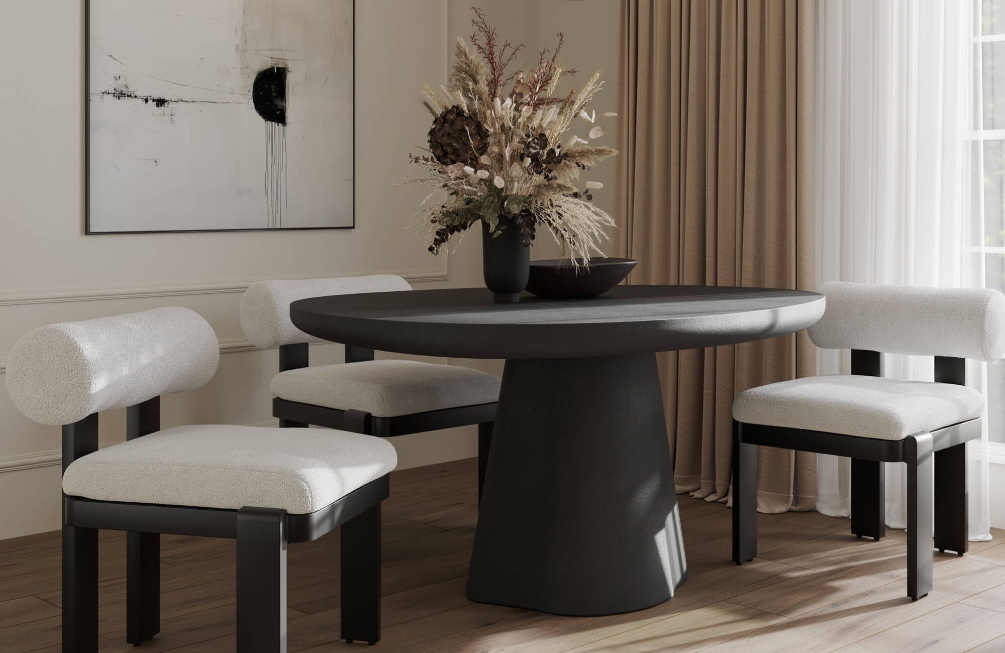 Modern dining area featuring a sculptural black dining room table set with a rounded pedestal table and plush upholstered chairs, accented by neutral drapery, abstract wall art, and a dried floral centerpiece for a contemporary aesthetic.