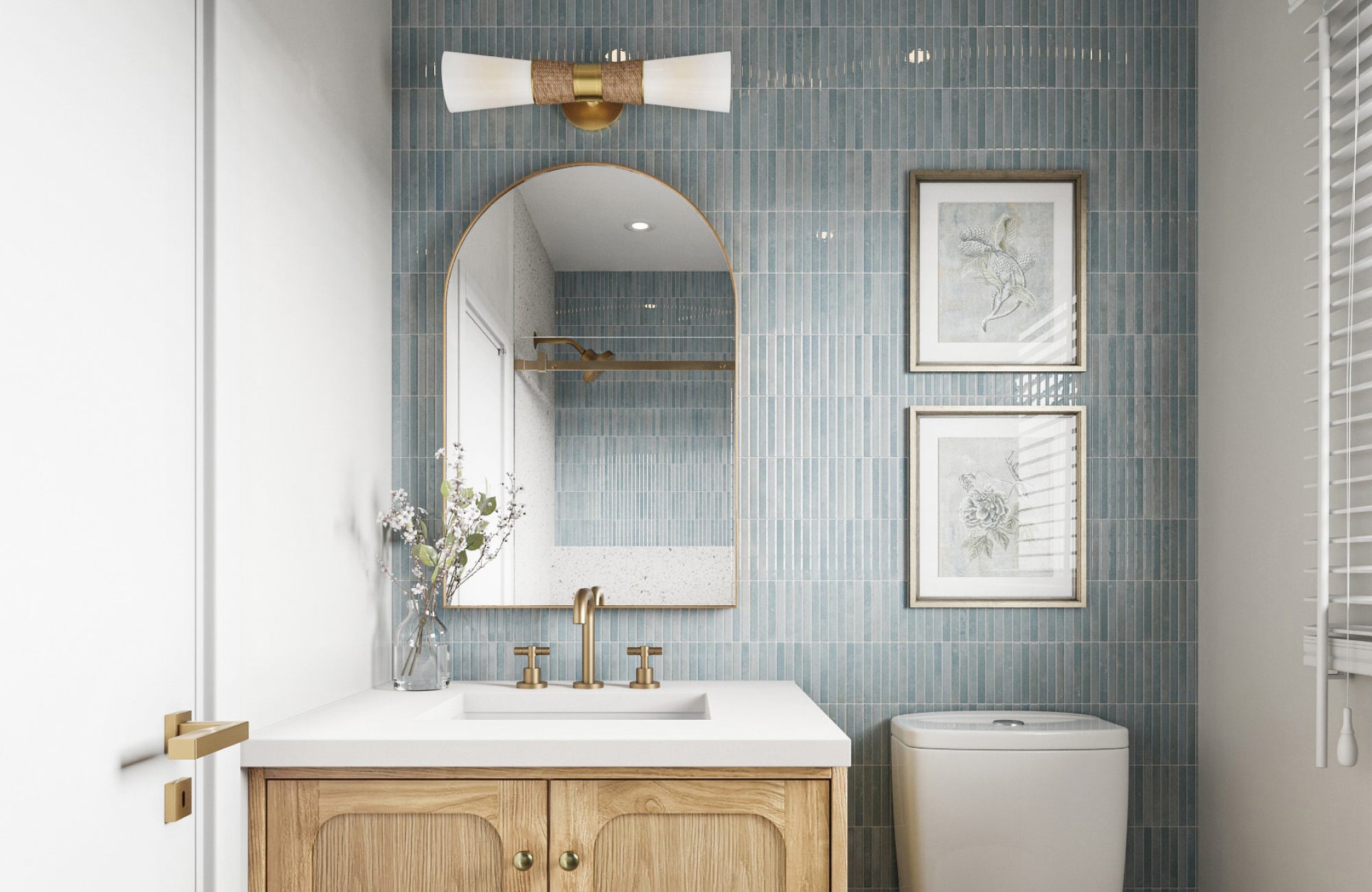 Small bathroom vanity with one overhead light centered above the mirror for simple, space-saving illumination.