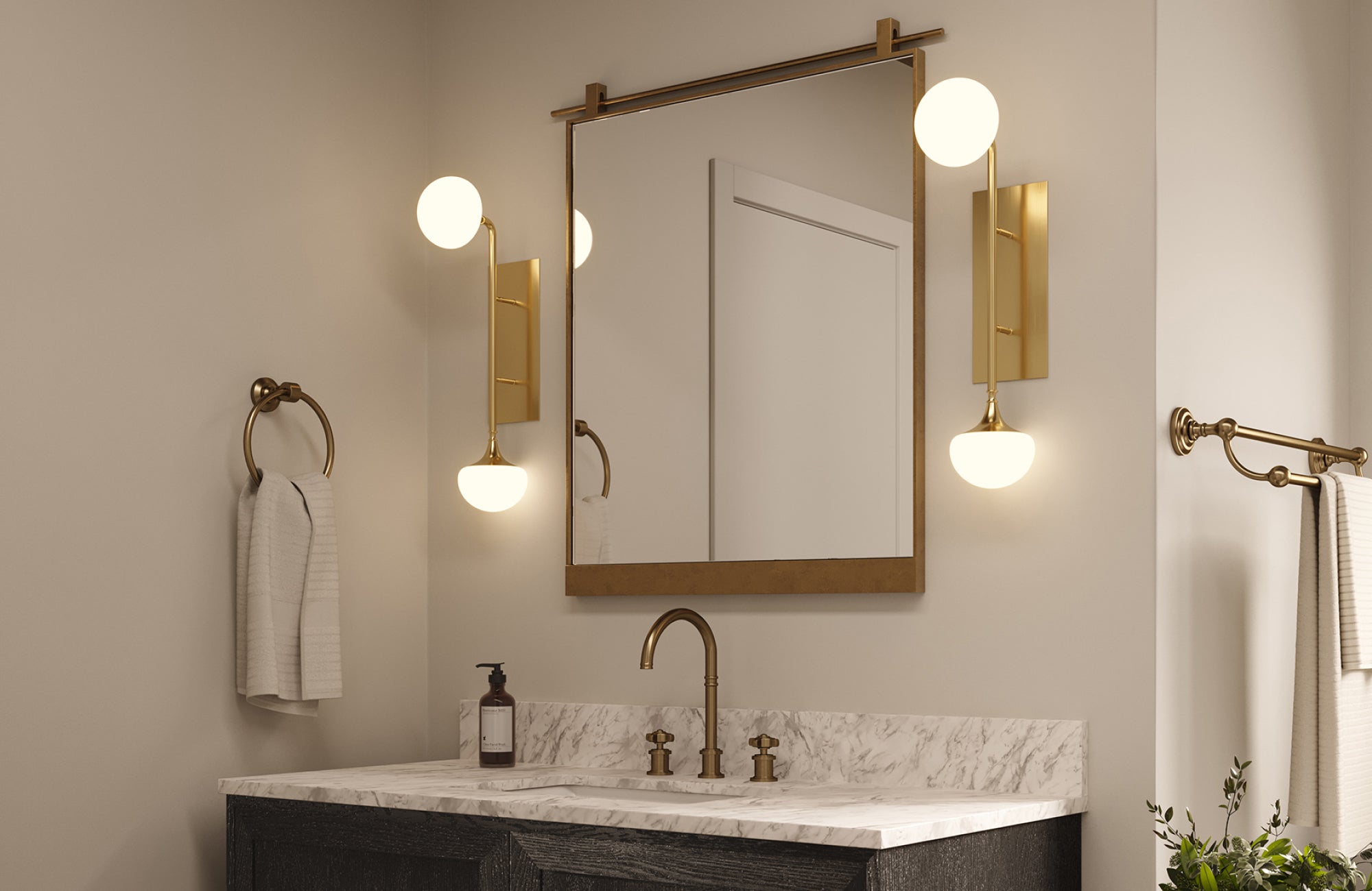 Vanity with two wall sconces positioned beside the mirror for bright, even illumination across the face.