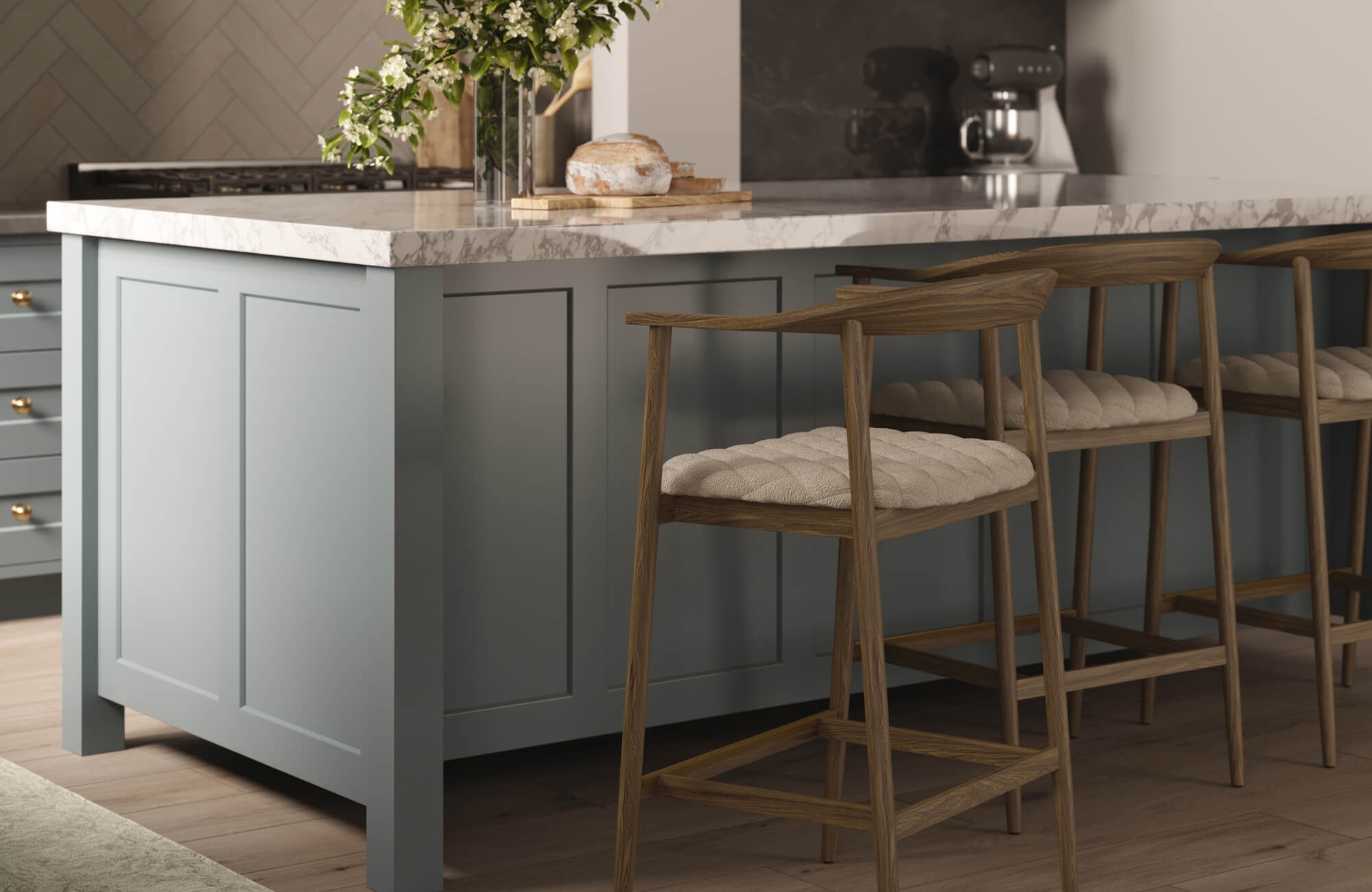 Compact kitchen island with two stools, highlighting a minimal seating approach for small spaces.