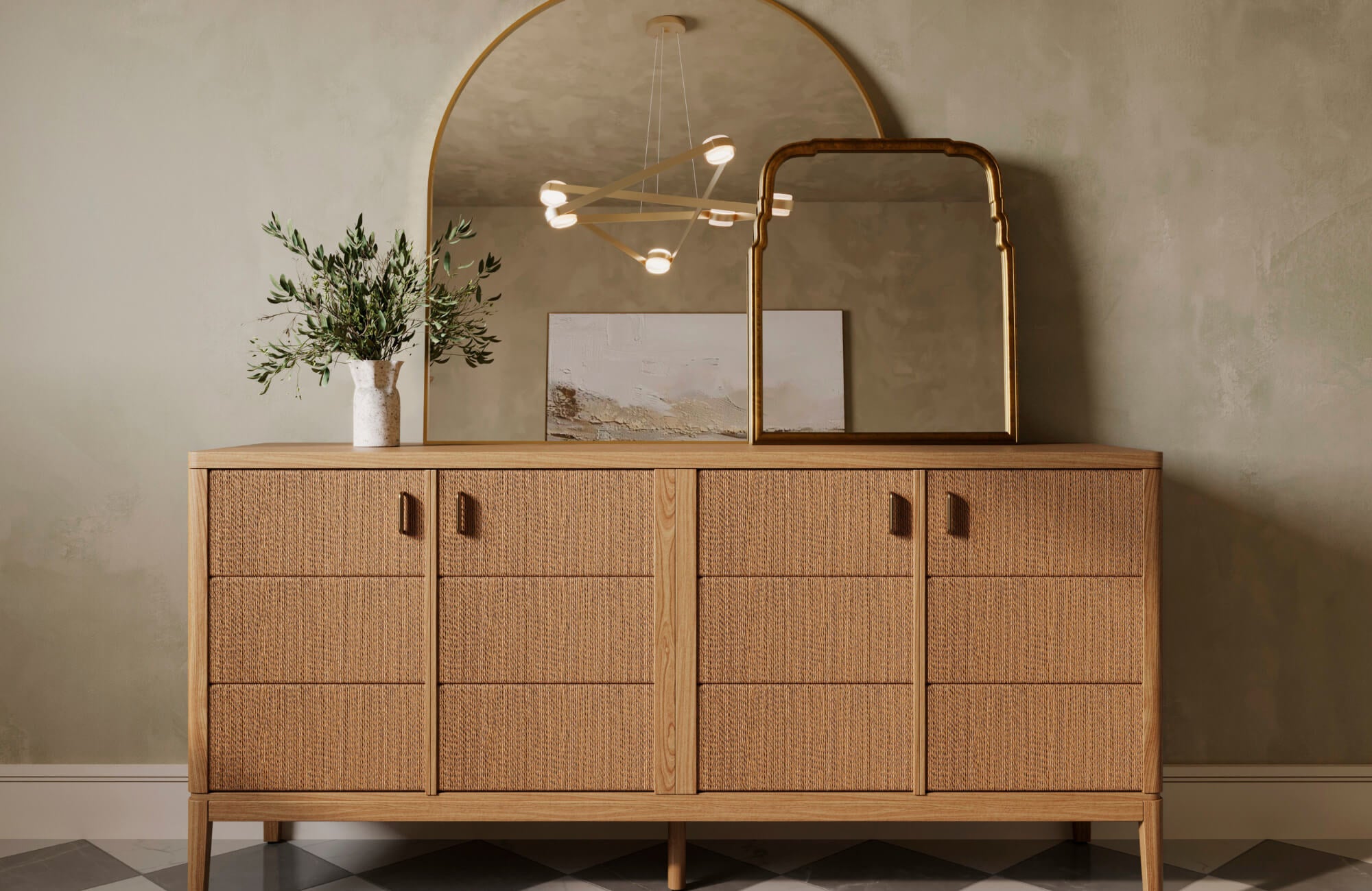 null Wide wood sideboard styled with a large arched mirror and decor, demonstrating proper wall spacing and proportional balance above furniture.