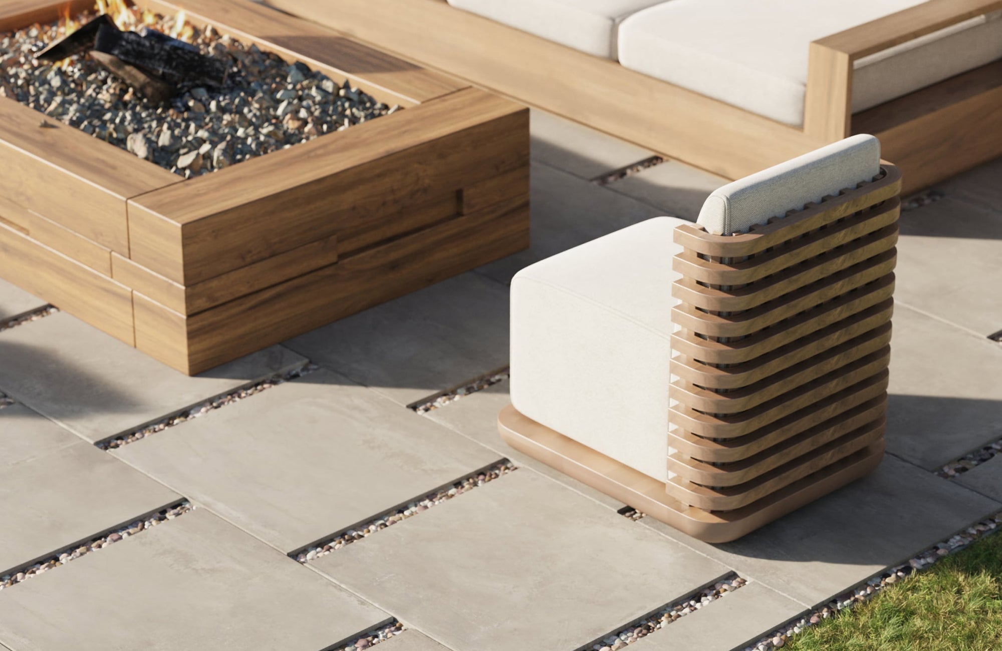 Outdoor porcelain tiles in a backyard lounge area, featuring 2 cm textured pavers installed with decorative grout gaps around seating.