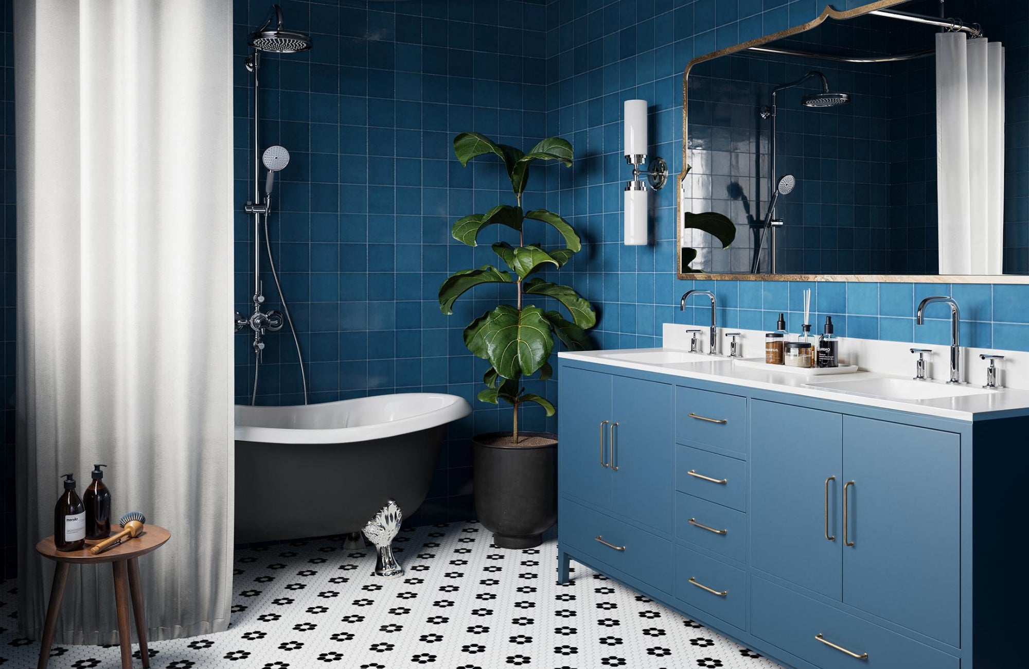 A rich blue bathroom showcasing a full-wall backsplash that complements the vanity and lighting proportions.