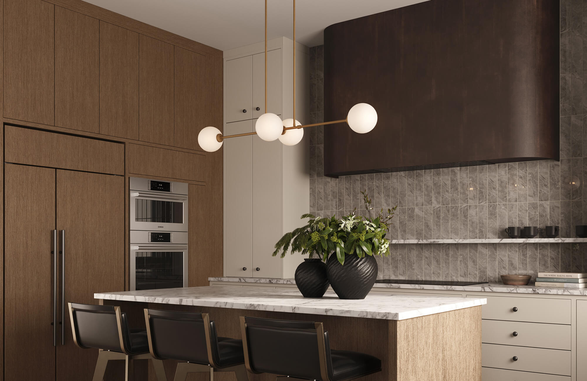 null A modern linear pendant with globe lights hangs above a marble kitchen island with dark wood cabinetry.