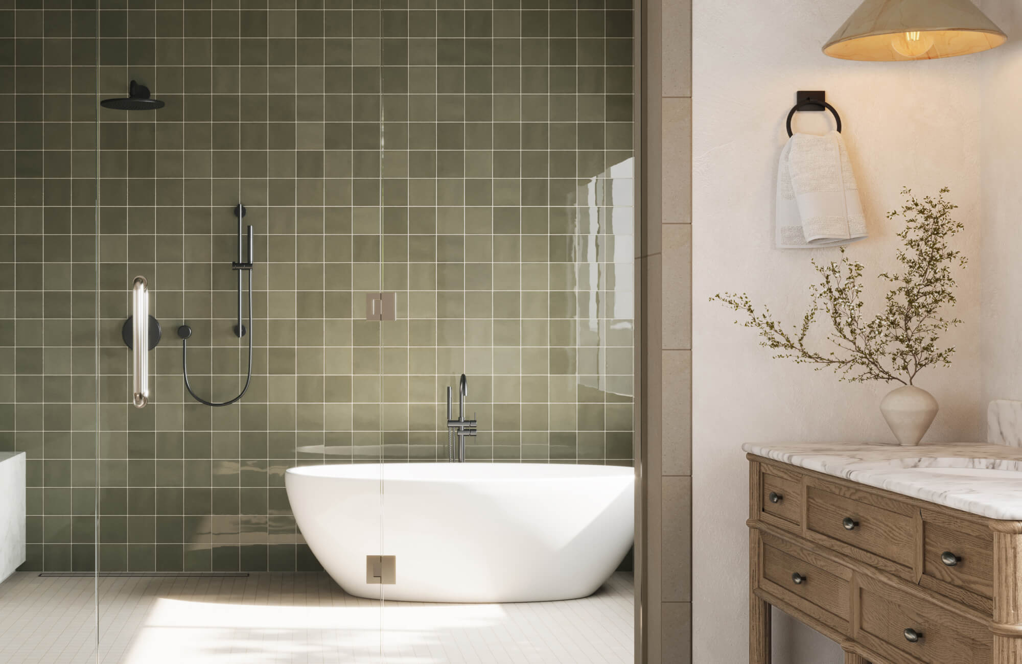 Spa-style bathroom with olive green square wall tiles, black fixtures, freestanding tub, and rustic wood vanity.