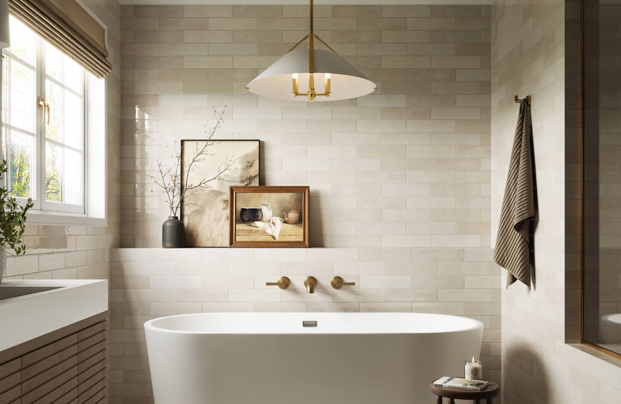null Elegant spa-style bathroom with warm beige tiles, brass hardware, and a sculptural pendant light over a soaking tub framed by minimalist artwork.