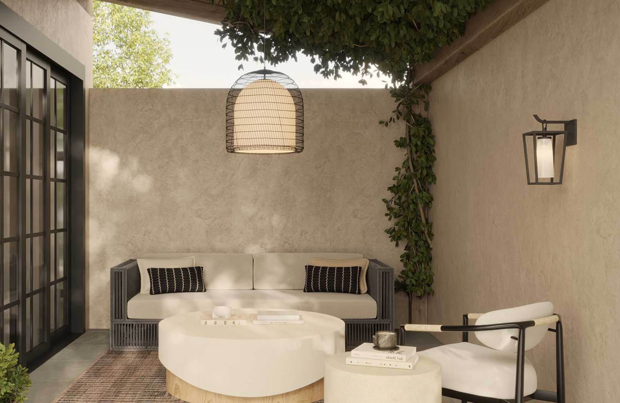 null A compact outdoor seating nook features rectangular accent cushions proportioned to complement the sofa's scale without overwhelming the arrangement.