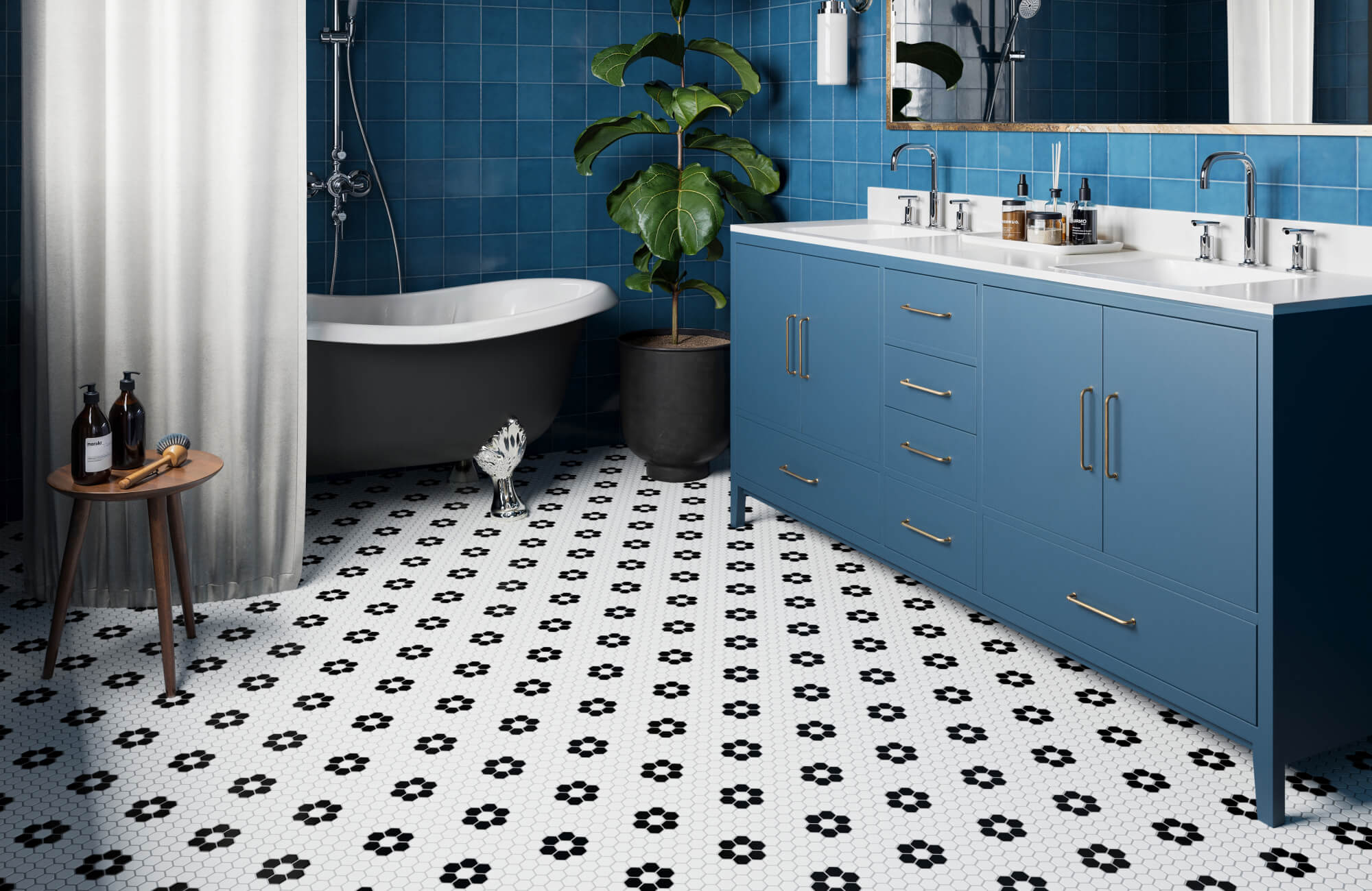 null Stylish bathroom featuring floral-pattern mosaic tiles on the floor, a double-sink vanity, and a clawfoot bathtub.