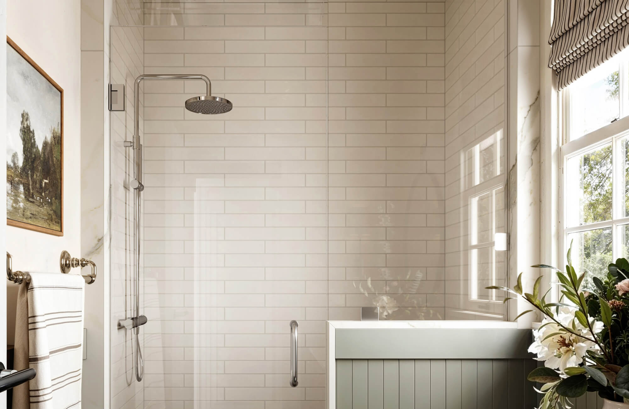 Serene bathroom with glossy white subway wall tile in shower, chrome rain showerhead, and natural light creating a bright, clean, timeless atmosphere