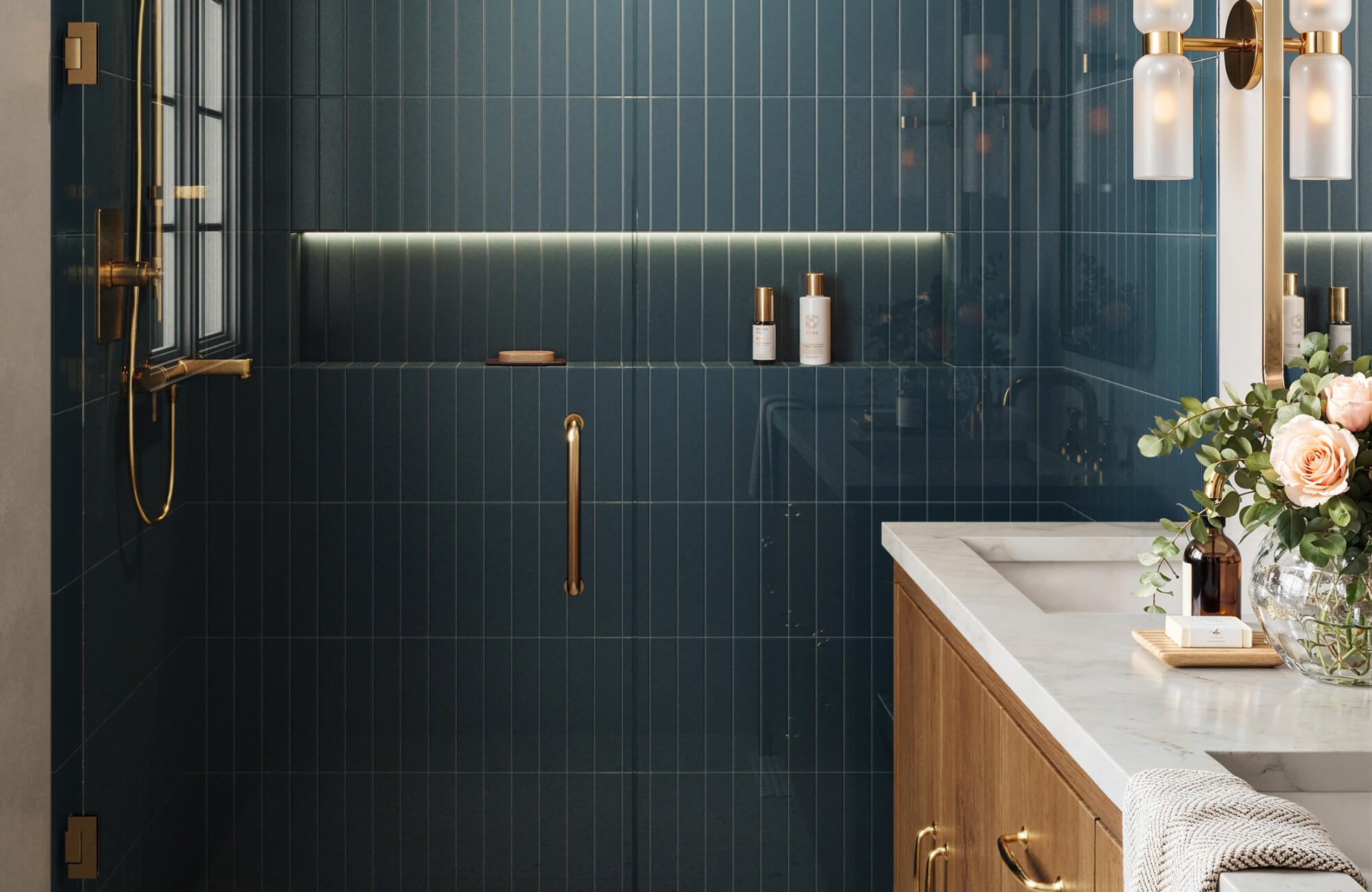 Sophisticated bathroom adorned with blue-green subway tiles featuring delicate vertical lines, paired with gold accents and soft lighting for a luxurious, serene retreat.