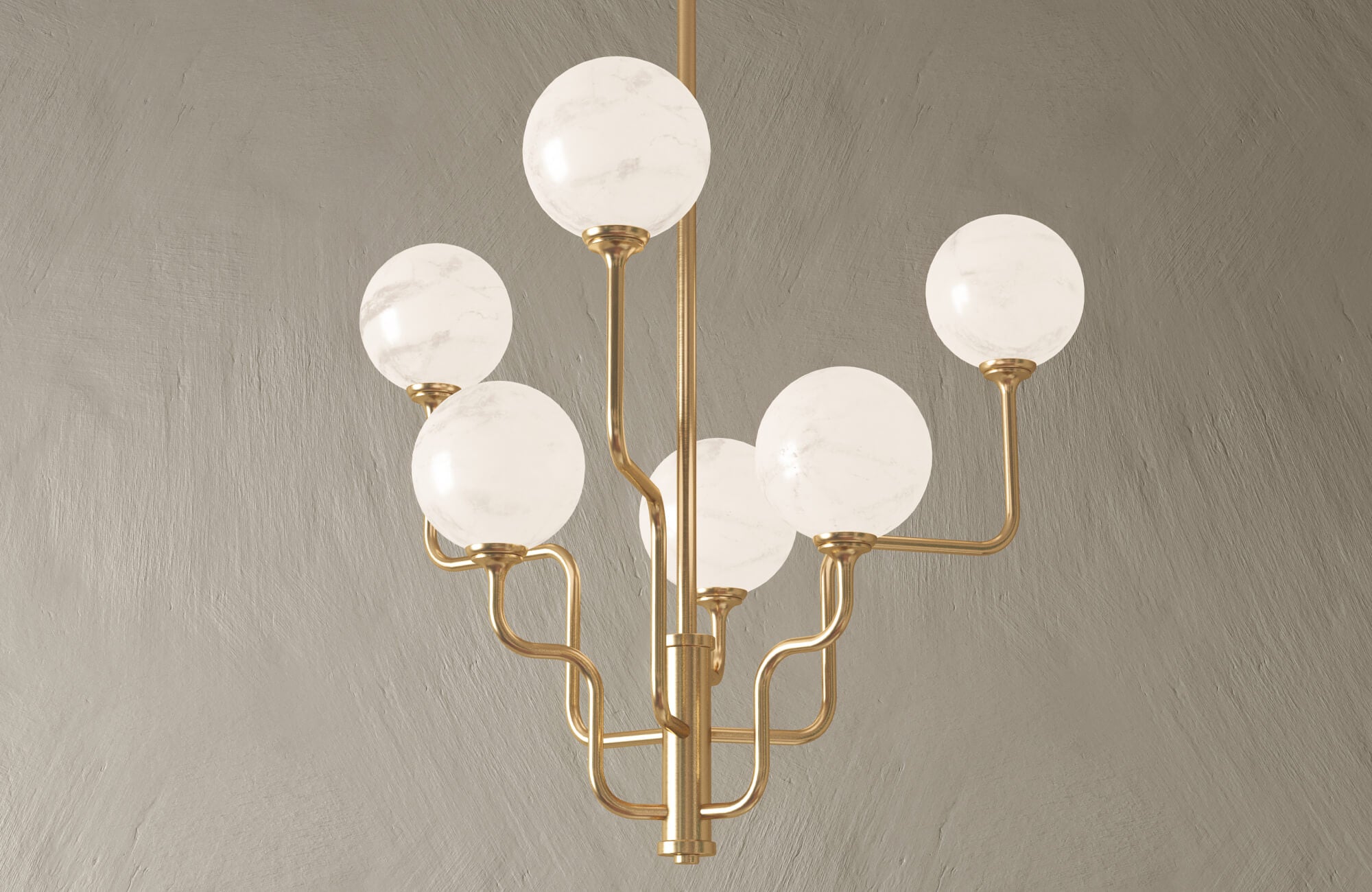Statement brass chandelier with globe lighting, blending sculptural form and warm finishes for a refined, contemporary look.