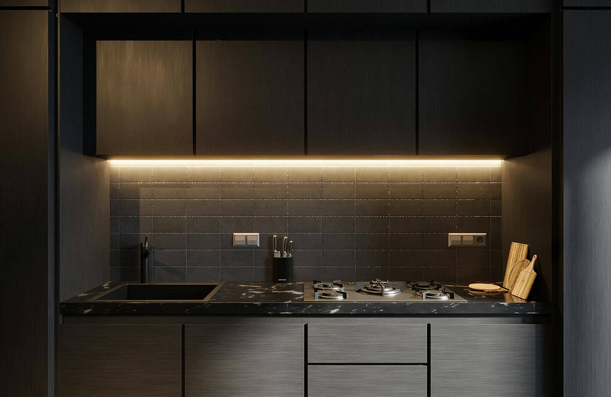 null Compact kitchen with a dark-toned palette, featuring a grid of black square tiles, integrated cooktop, and ambient LED lighting beneath sleek upper cabinets.