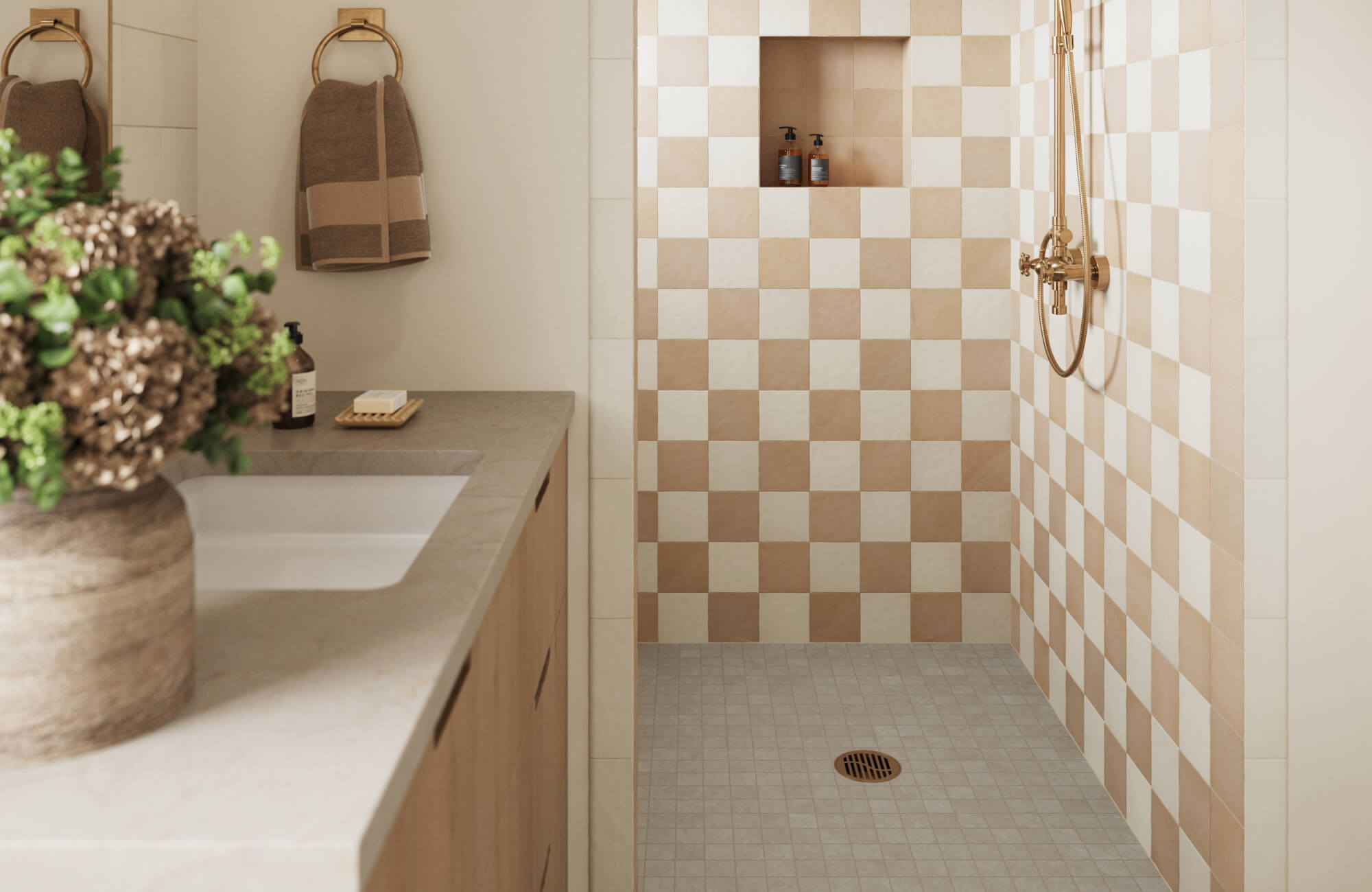 Bathroom featuring beige and white checkerboard wall tiles, minimalist fixtures, and a neutral-toned vanity with natural accents.