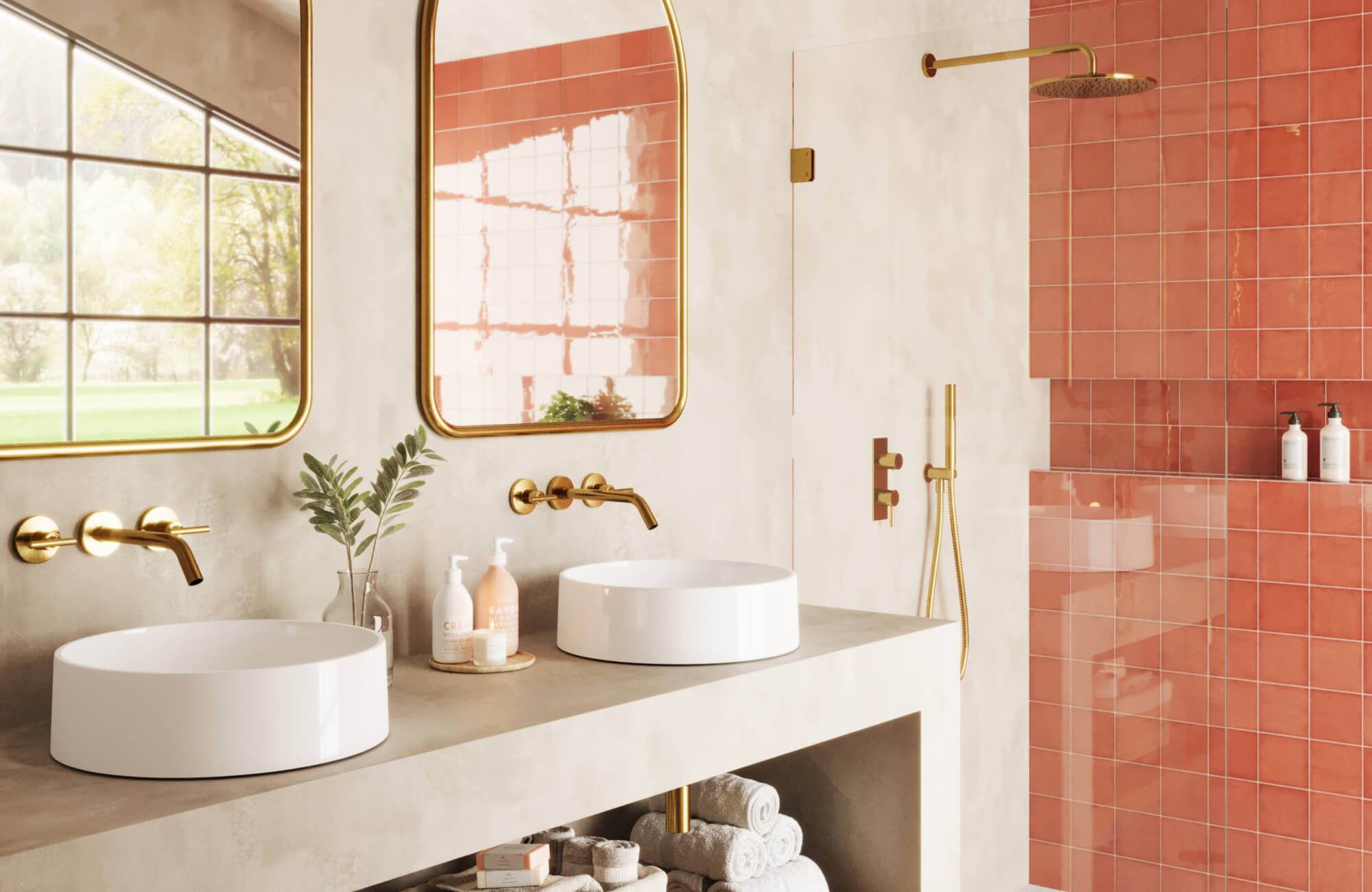 Vibrant bathroom with glossy coral square tiles, dual white vessel sinks, and brass fixtures, creating a bold, contemporary look.