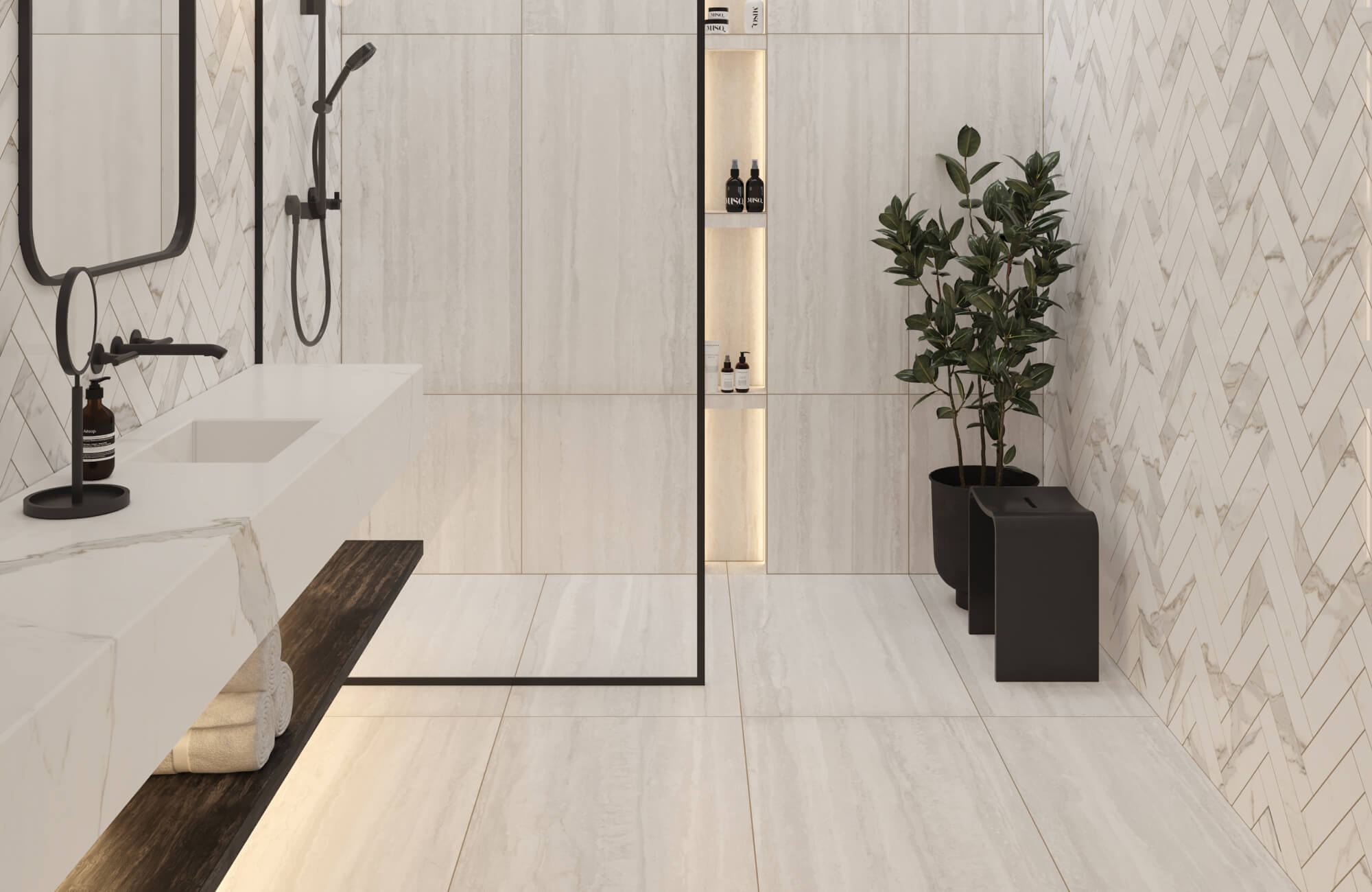 Sophisticated bathroom with marble herringbone accent walls paired with large format tiles, creating a seamless balance of texture and modern luxury.