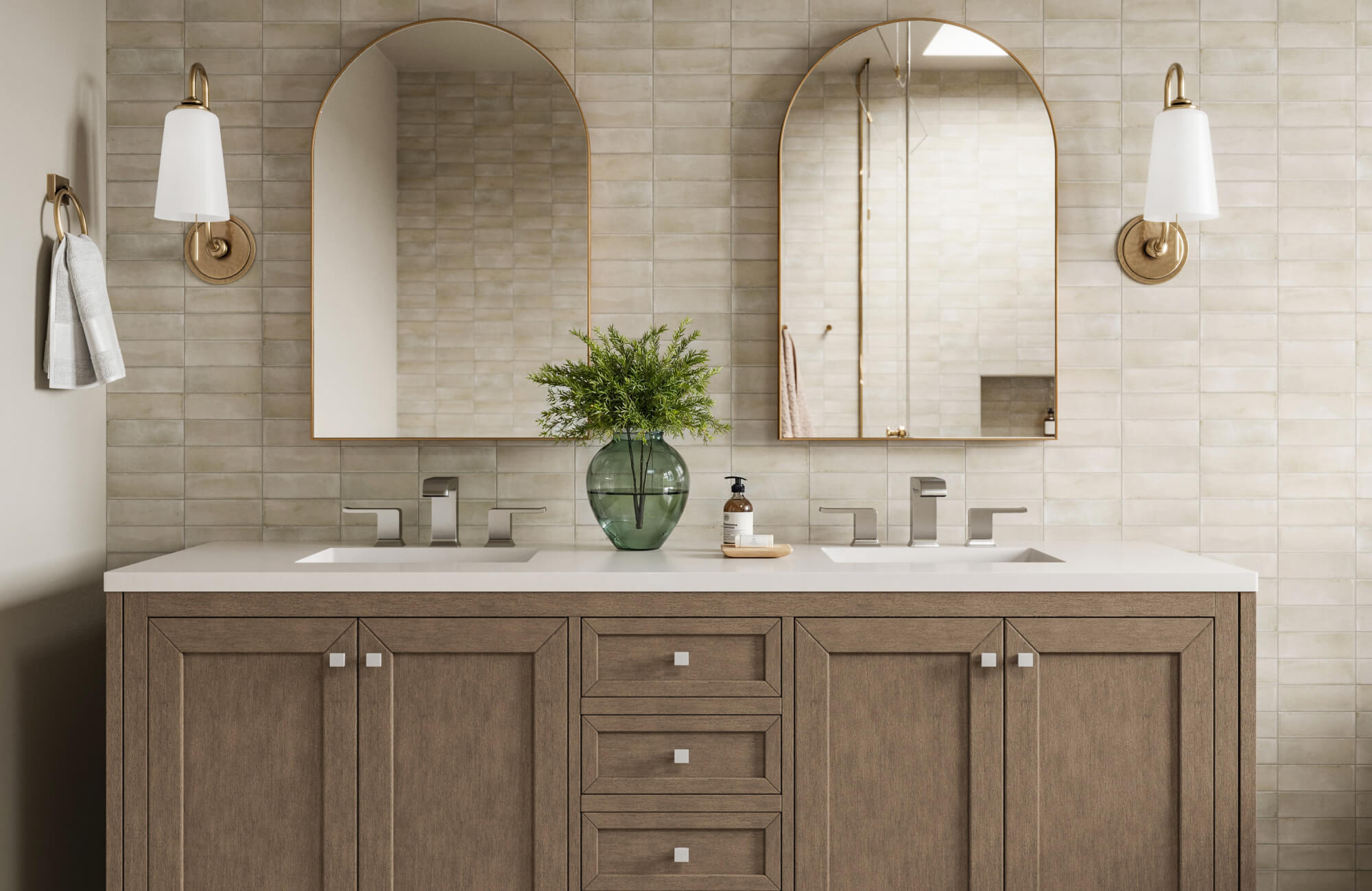 null Elegant bathroom with warm beige subway tiles, dual arched mirrors, and a wood vanity topped with white counters.