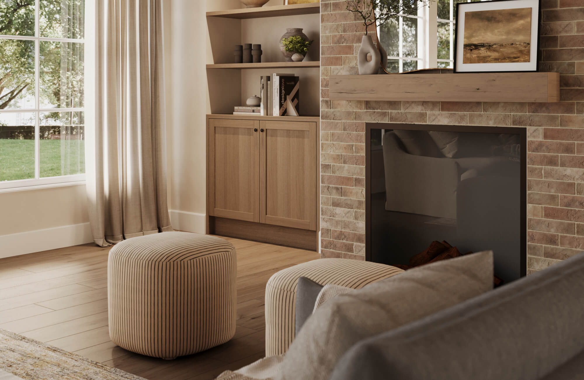 Cozy brick-tiled fireplace with a simple wood mantel, paired with built-in cabinetry and soft neutral seating that creates a calm, light-filled living space.