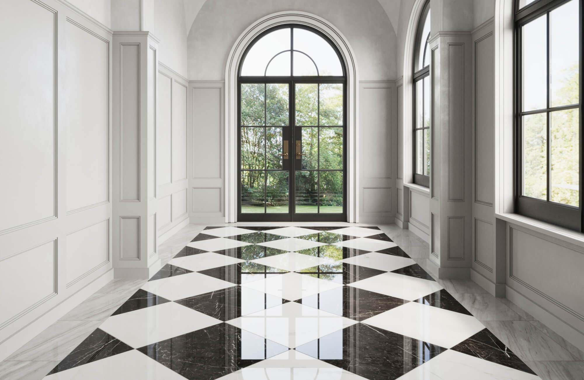 null Grand foyer featuring a glossy black and white marble checkerboard floor, framed by tall arched windows and a stunning garden view.