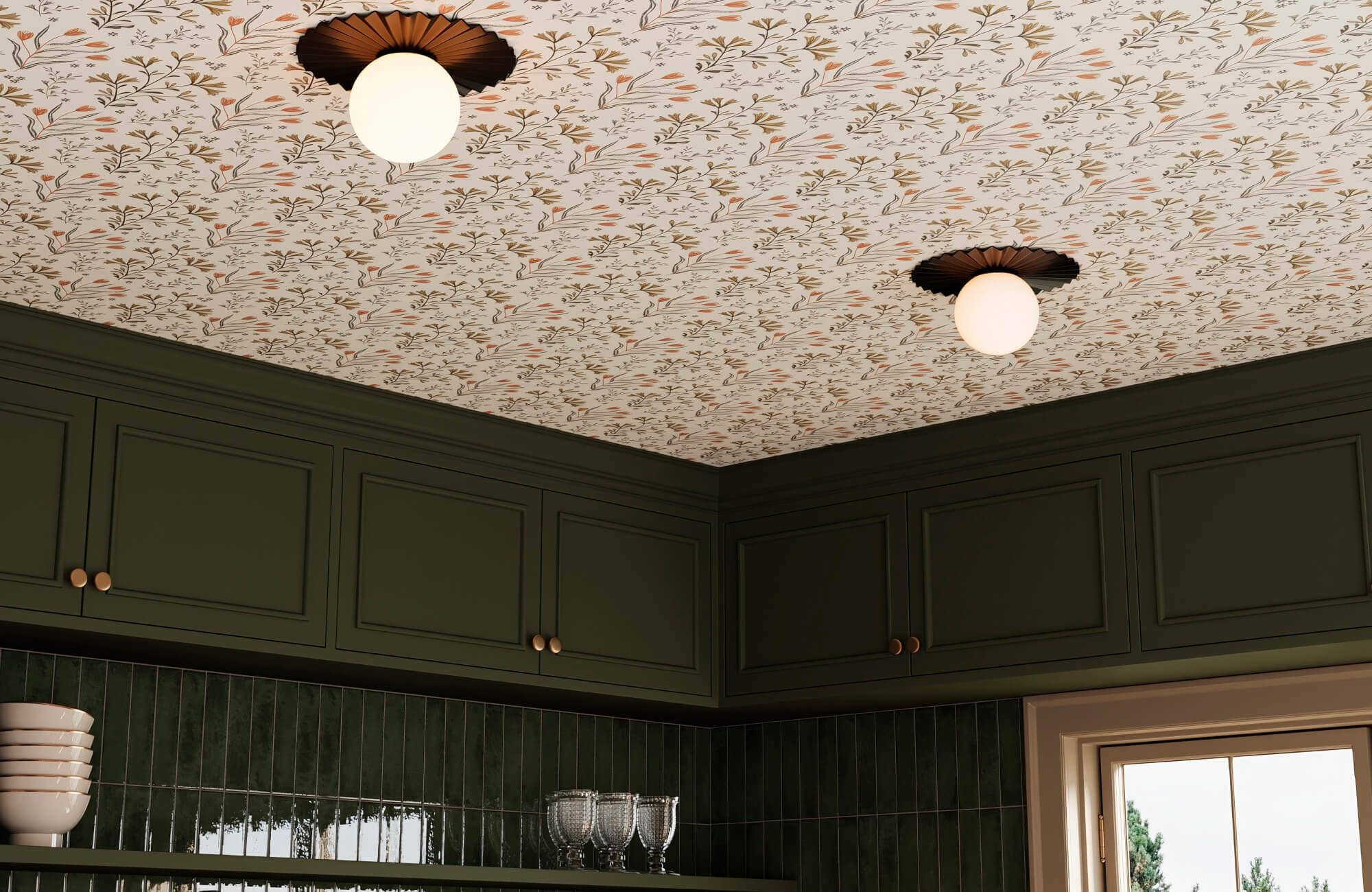 null Dark green kitchen with gold cabinet knobs, a glossy green vertical tile backsplash, and a cream ceiling covered in a small scattered orange and gold floral botanical pattern.