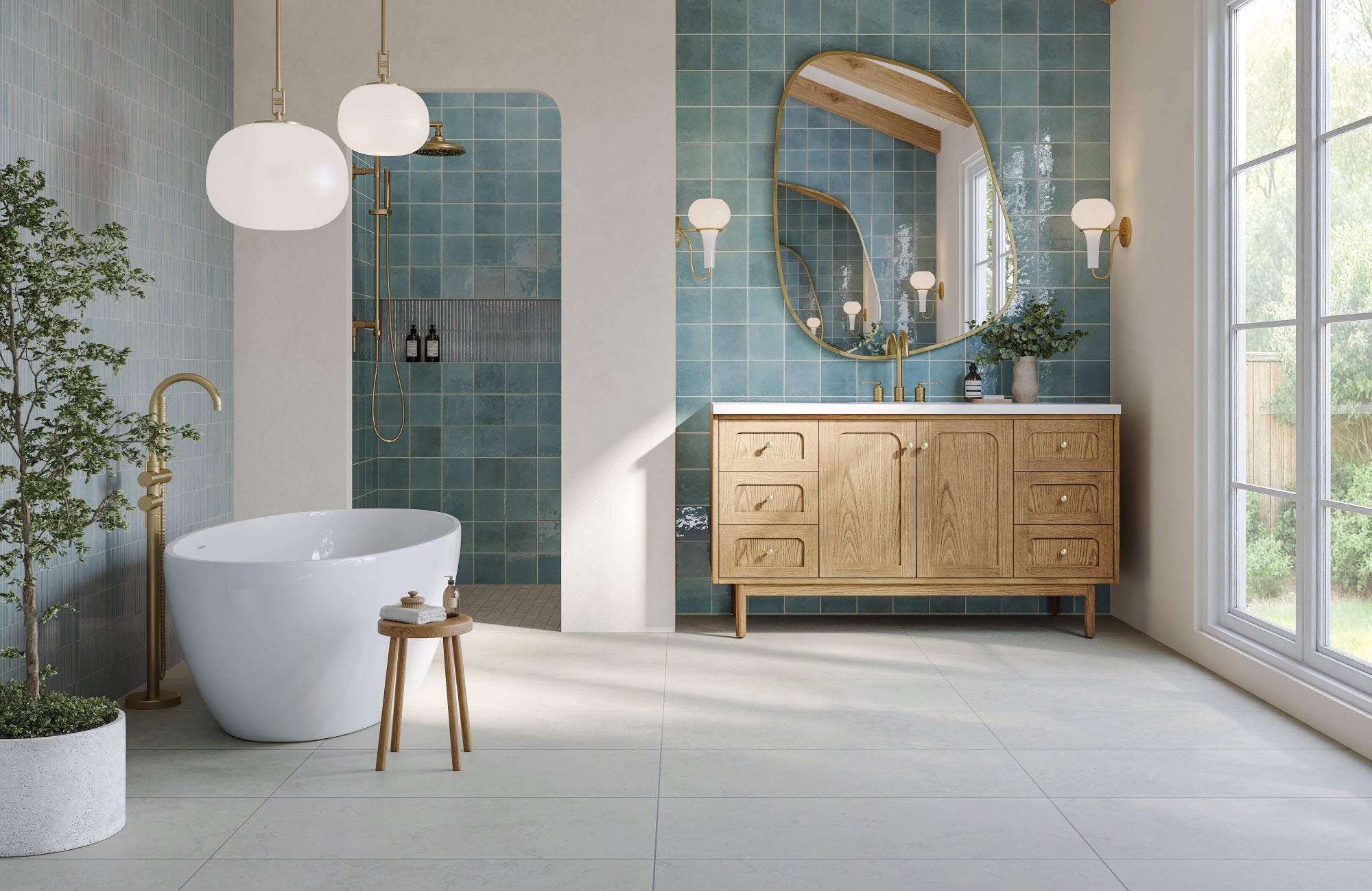 Large irregular mirror above vanity reflecting windows, layering with furniture to create depth and visual dimension.