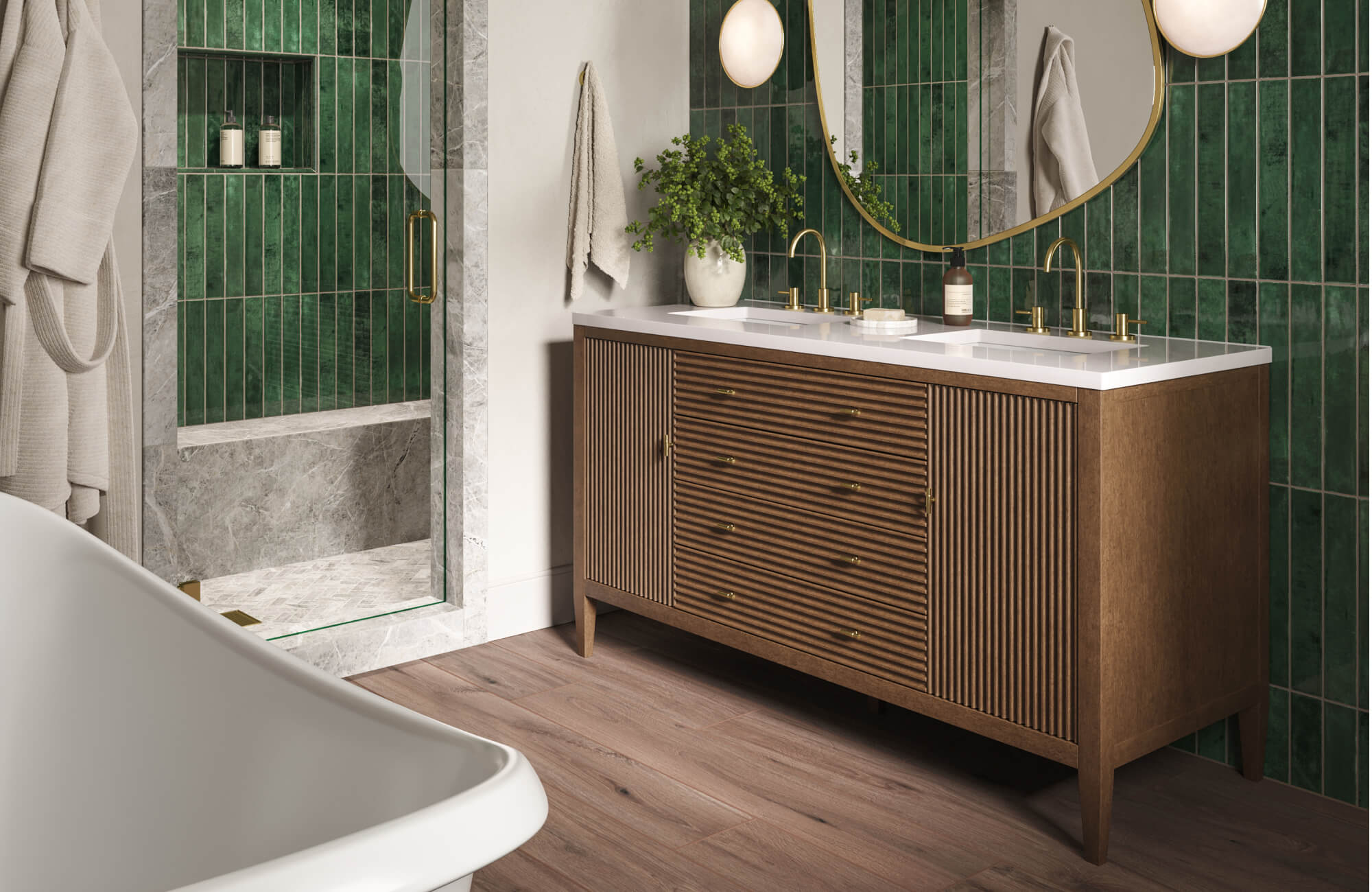 null Moody bathroom with deep green vertical tiles, fluted wood vanity, and brushed gold fixtures for a bold, modern-luxe vibe.
