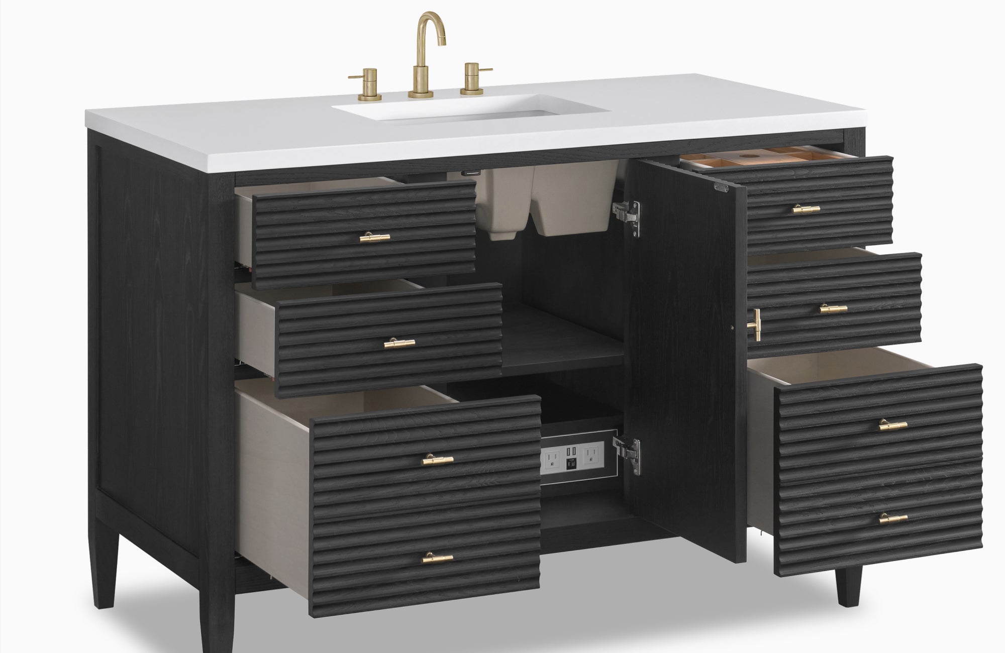 Modern black vanity with ribbed drawers, marble top, and open storage, showcasing multiple compartments.