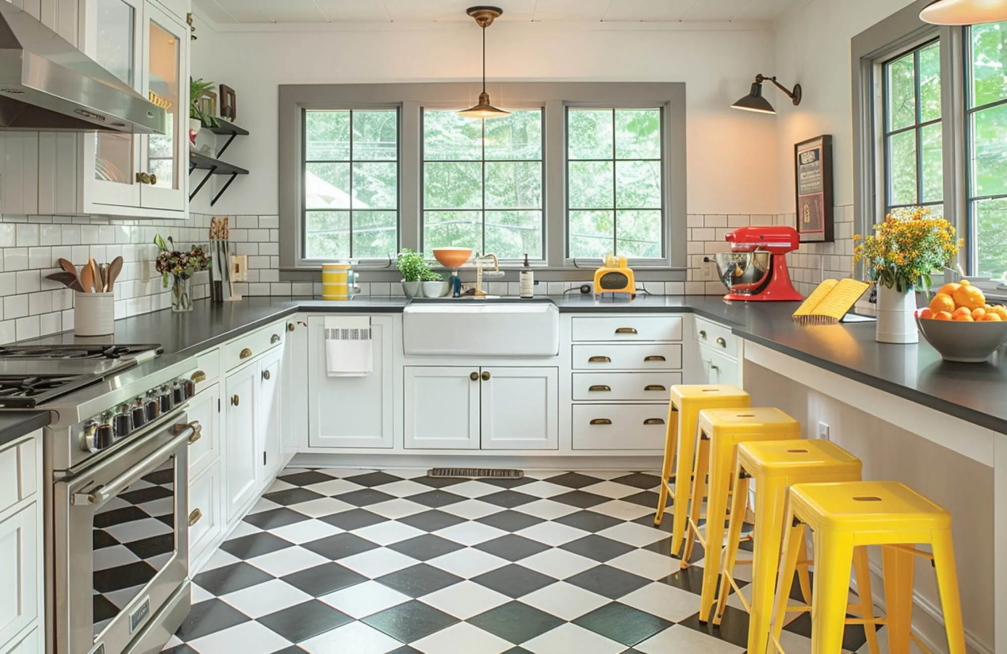 Charming kitchen with black and white checkered tile flooring, white cabinets, and bright yellow stools adding a pop of color under natural light.