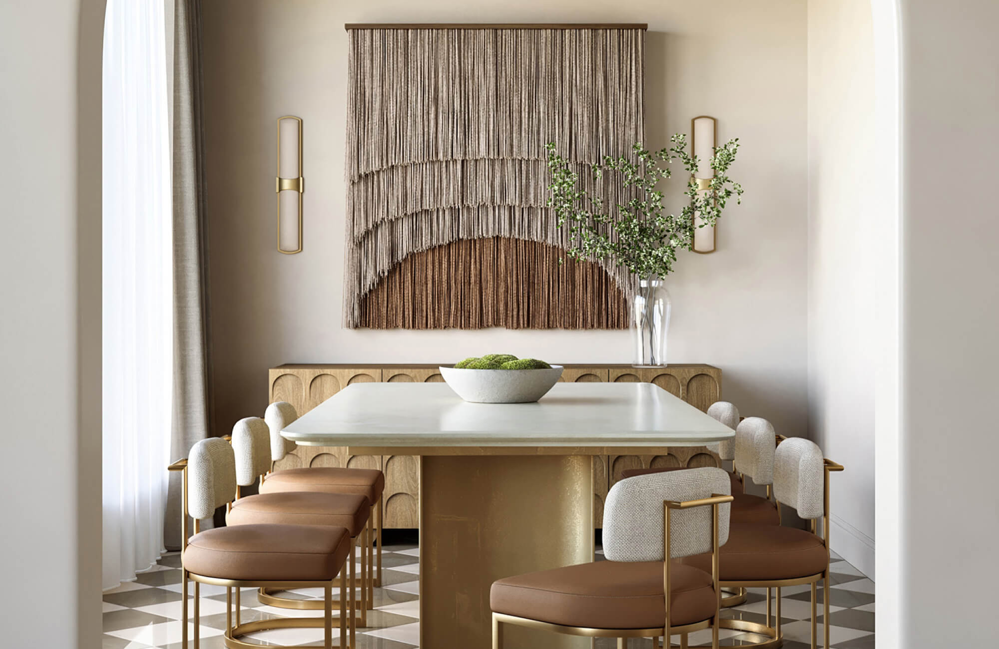 null A light marble dining table in an elegant room with warm tones, gold accents, and upholstered seating.