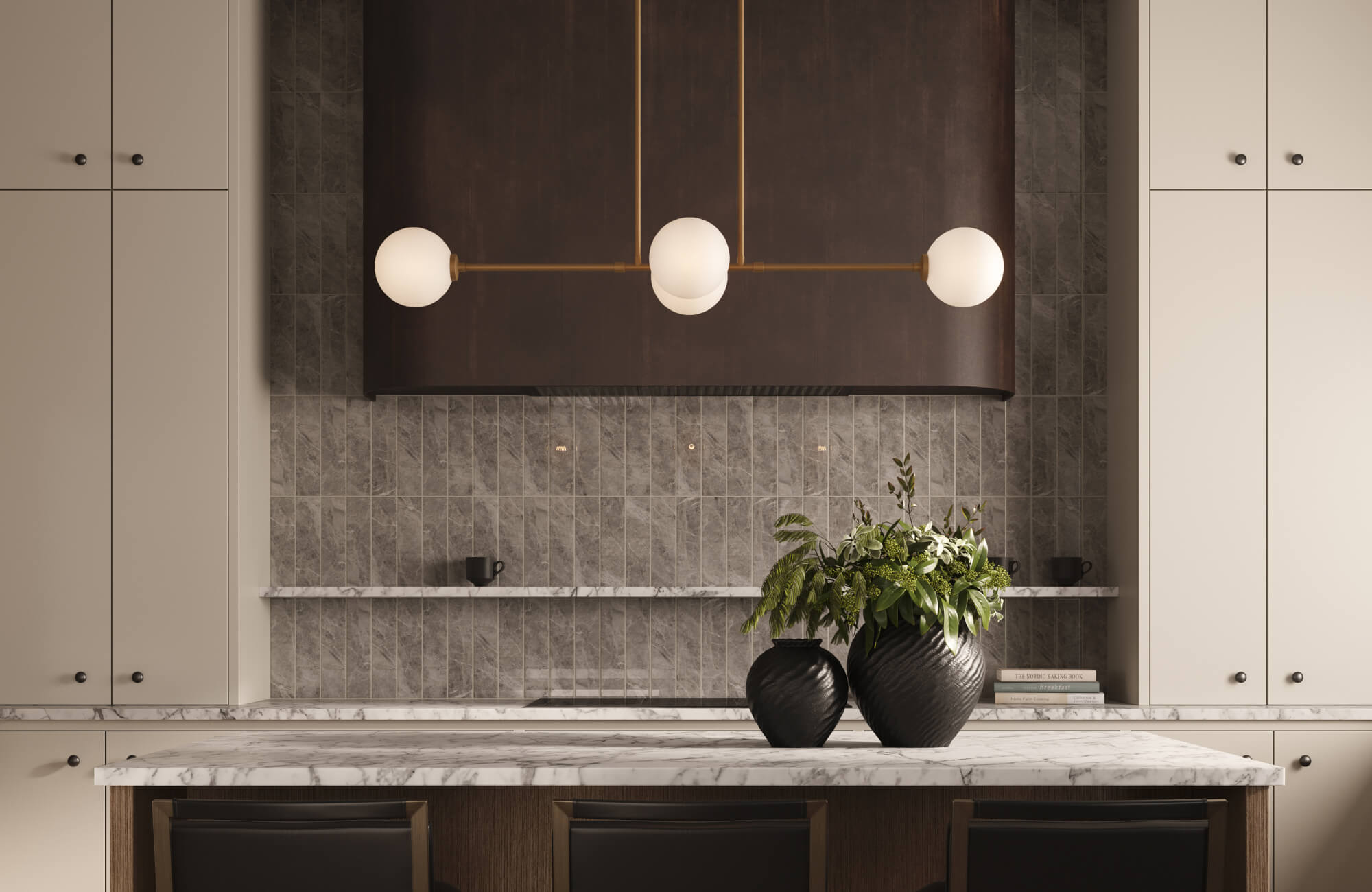 Vertical stone tile backsplash introduces subtle texture and contrast, balancing warm cabinetry and a sleek island design.