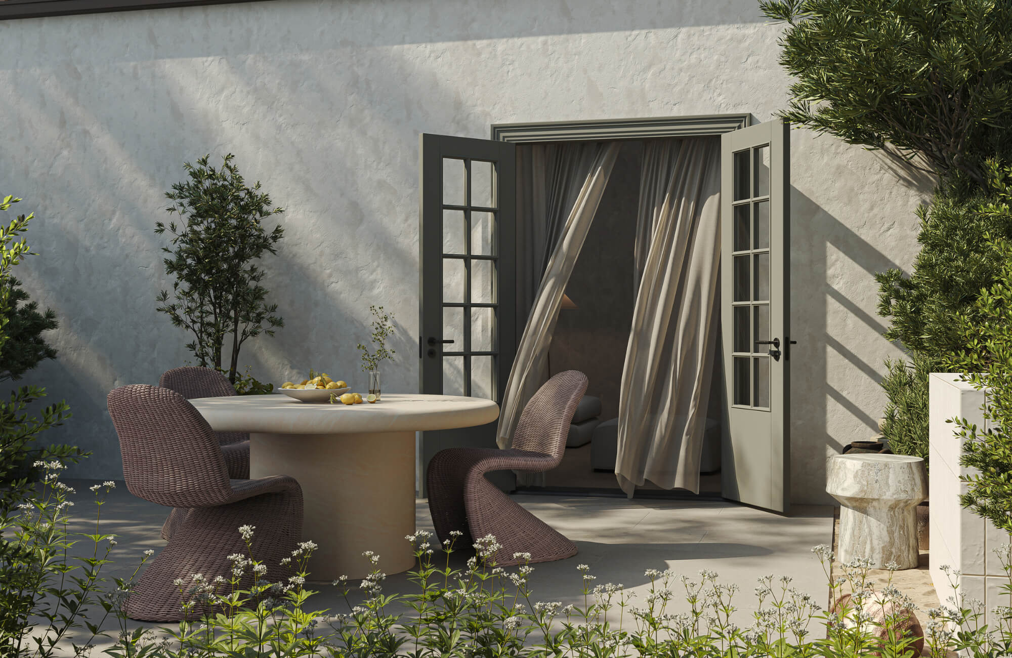 null Outdoor dining space with sculptural chairs, round table, open French doors, and soft drapery blending indoor and outdoor living.