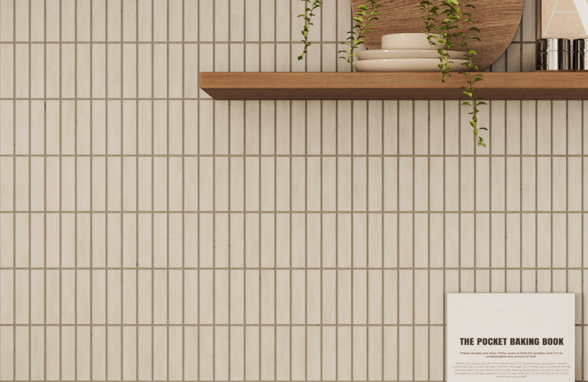 Light cream subway porcelain tiles with fine grout lines, styled with wood shelving, ceramics, and trailing greenery.