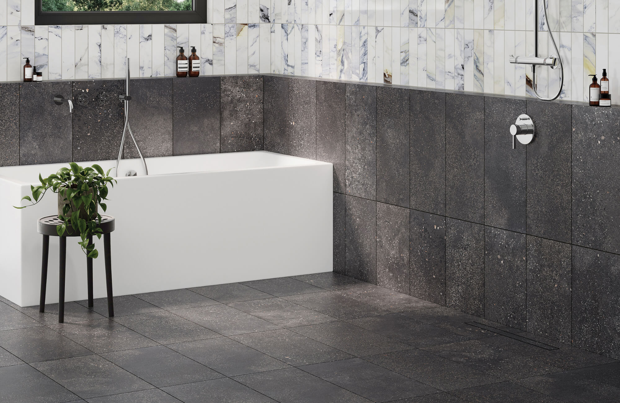 null Modern bathroom with dark terrazzo tile floors and walls, paired with a freestanding tub for a sleek, spa-inspired design aesthetic.