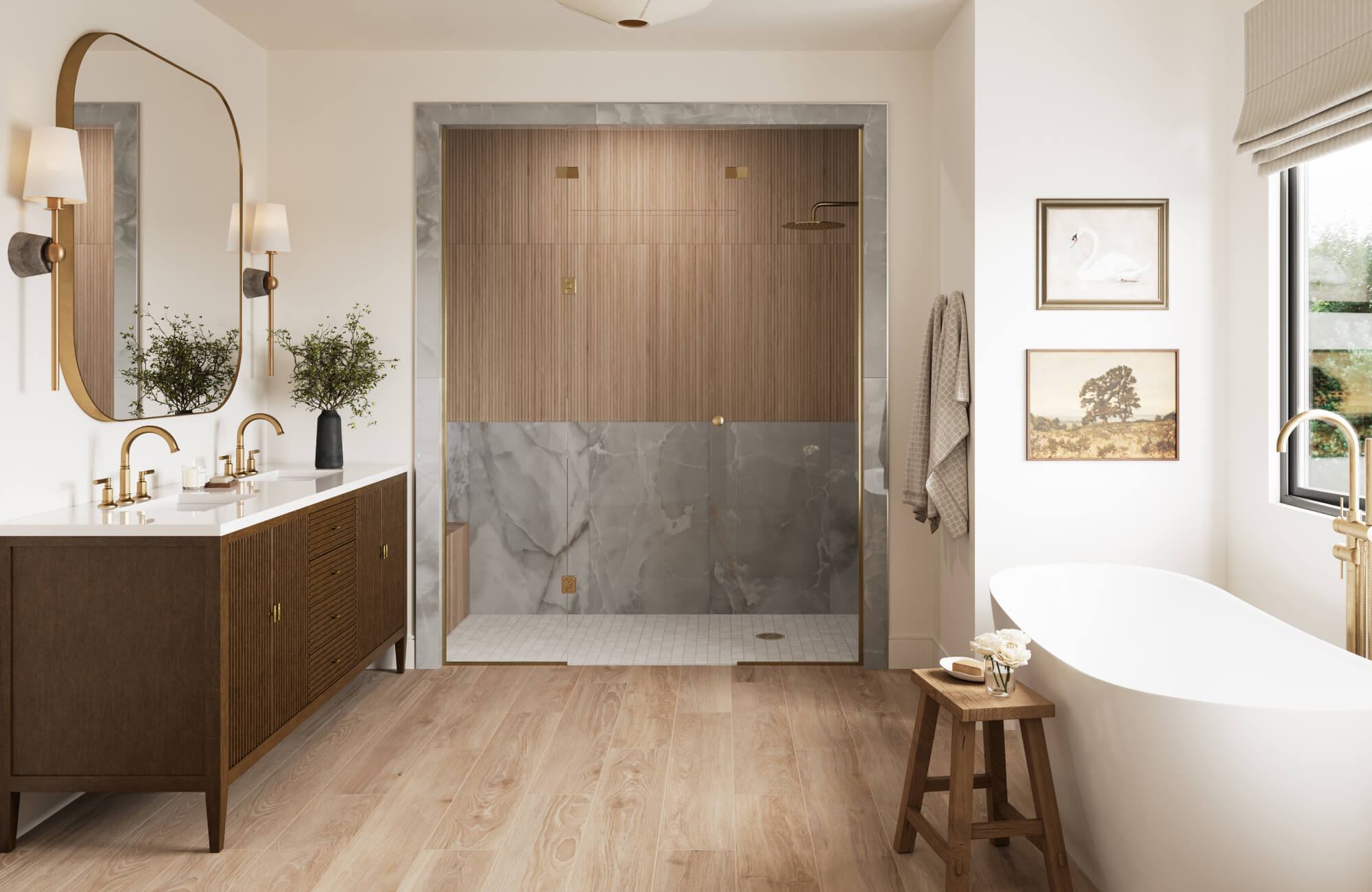 Bright bathroom with flooring that looks like wood, a freestanding tub, a wood vanity, brass fixtures, and a glass-enclosed shower with stone-look and fluted wall tile.