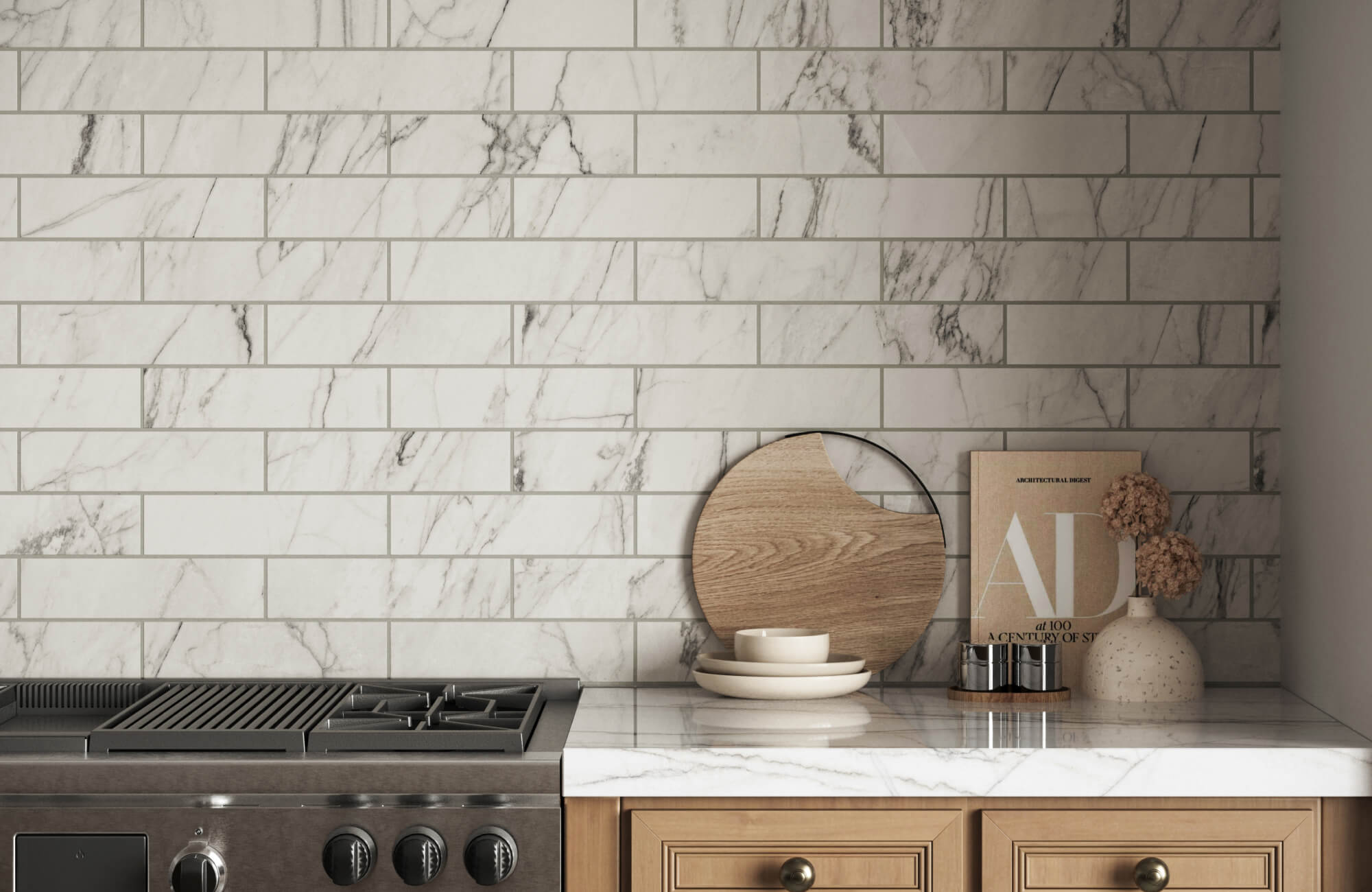 Marble subway tile backsplash in a kitchen with warm wood cabinetry, styled with modern decor and sleek stainless steel appliances.
