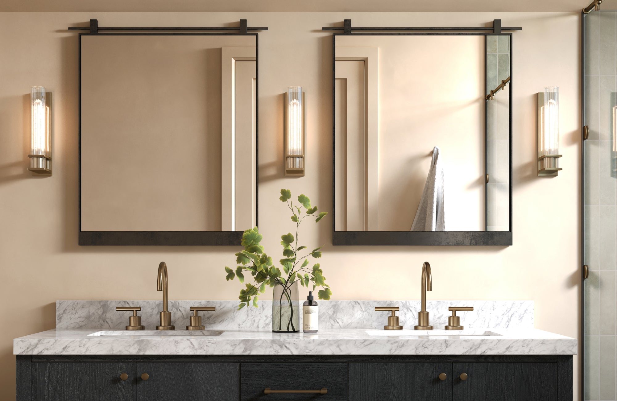 Pair of square mirrors hung above dual sinks with marble counter and vertical sconces in a modern bath.