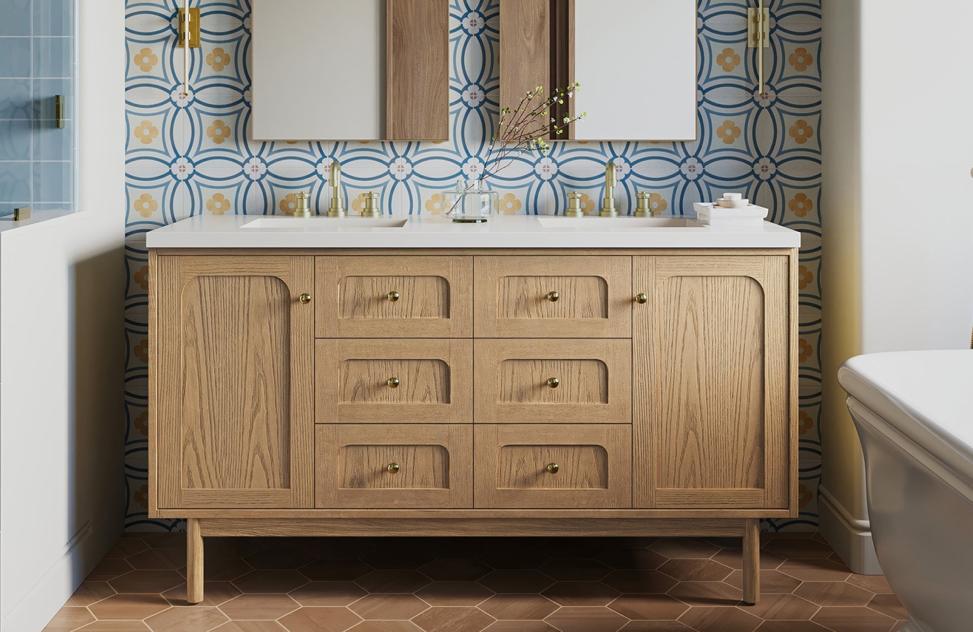 Double vanity placed against the wall, framed by patterned tile and an arched alcove for a classic, cohesive feel.