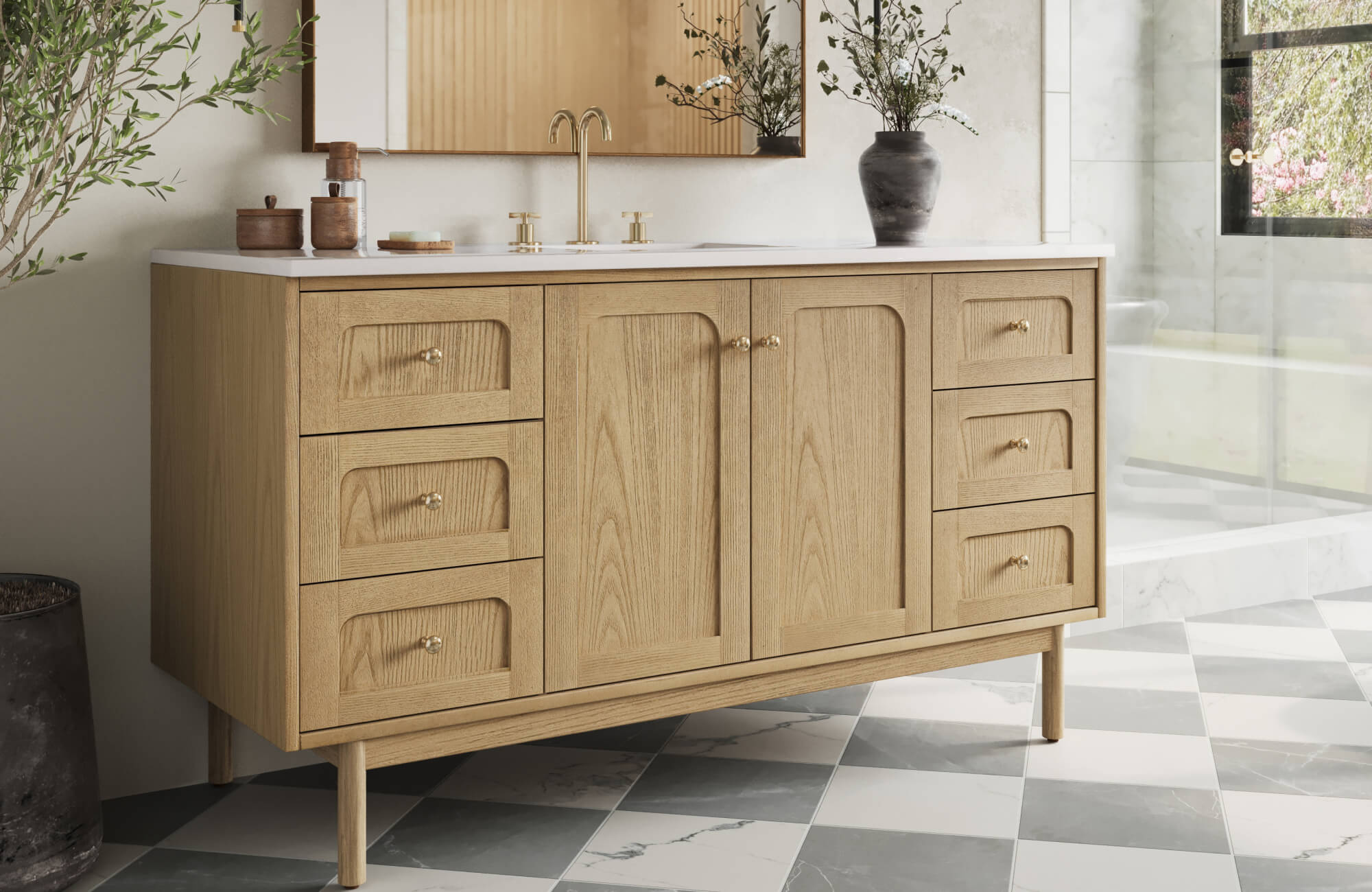 Modern bathroom featuring a light natural oak vanity with soft curves, brass fixtures, crisp white quartz top, and bold checkerboard marble floor tiles